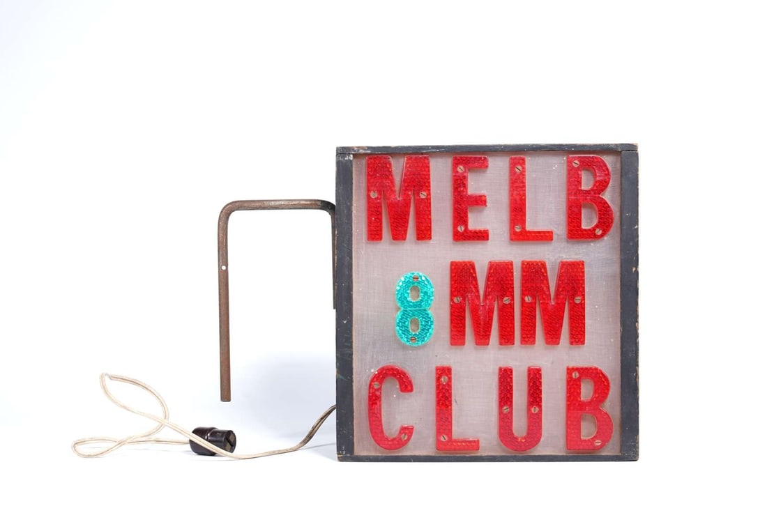 The original vintage illuminated sign for the Melbourne 8mm Movie Club: The original vintage illuminated sign for the Melbourne 8mm Movie Club, with hanging bracket, 27H x 38W x 13D, the Melbourne 8mm Club was possibly the first Cine Club in the world to own their own bri