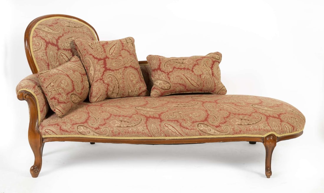 A Victorian red paisley upholstered chaise lounge: A Victorian red paisley upholstered chaise lounge