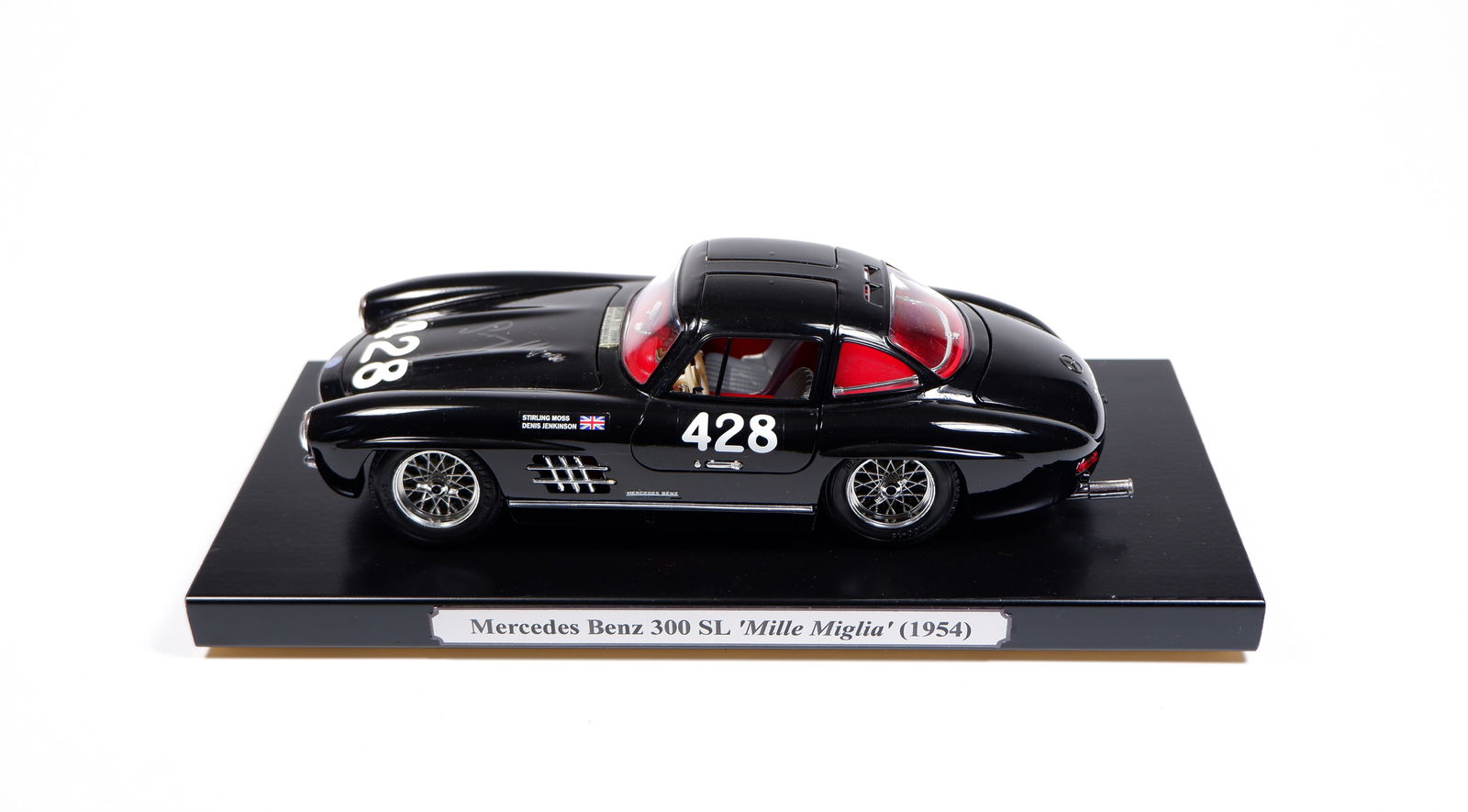 MOSS: A Bburago 1/18 scale KIT Mercedes-Benz 300 SL 'Mille Miglia'. Bonnet signed by Stirling Moss (1 of 6)