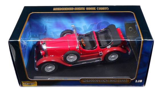 MERCEDES-BENZ: A RICKO 1:18 scale 1927 Mercedes-Benz 630K. Deep Red: MERCEDES-BENZ: A RICKO 1:18 scale 1927 Mercedes-Benz 630K, deep red body, burgundy chassis, black interior seats, opening features, engine detail; model attached to black base with descriptive plaque,