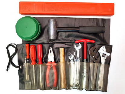 TOOL KIT: A 1970S AND 1980S ITALIAN TOOL ROLL. WITH TOOLS: TOOL KIT: An original black vinyl 1970s and 1980s Italian tool roll, housing Italian flat and phillips screwdrivers, hammer, multi-grips, adjustable 'PASTORINO' spanner (200mm), lead hammer (4 lb), sp