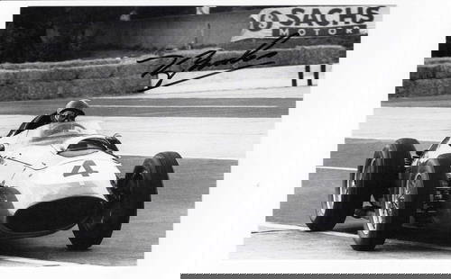 BROOKS: A Classic Ferrari Series postcard featuring Tony Brooks in a Ferrari 246. Brooks signature: BROOKS: A Classic Ferrari Series black and white postcard featuring Tony Brooks in a Ferrari Dino 246 at the 1959 German Grand Prix, postcard signed by Tony Brooks in black.