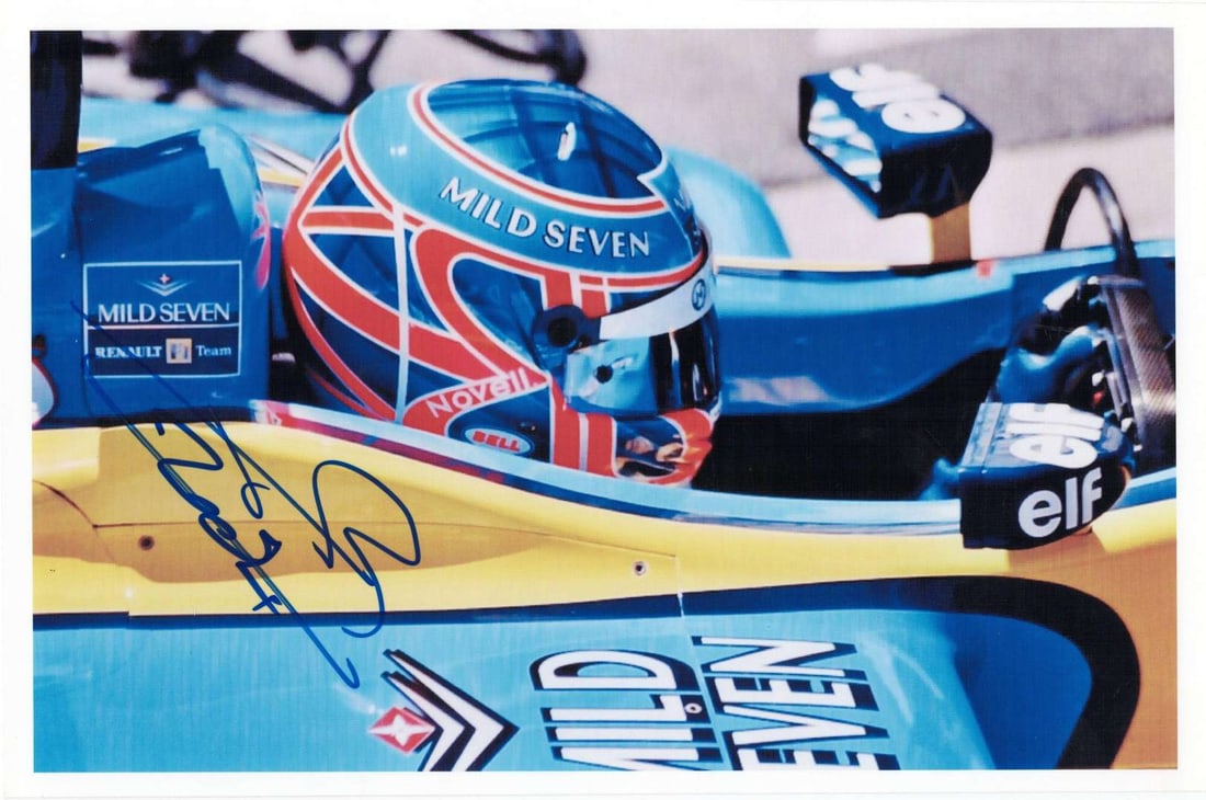 BUTTON: A colour image of Jenson Button racing a MILD SEVEN Renault R202. Button signature: BUTTON: A colour image of Jenson Button racing a MILD SEVEN Renault R202 during the 2002 Formula 1 season, image signed by Button; on thick stock paper, image measures approximately 24.5cm wide, 16cm 