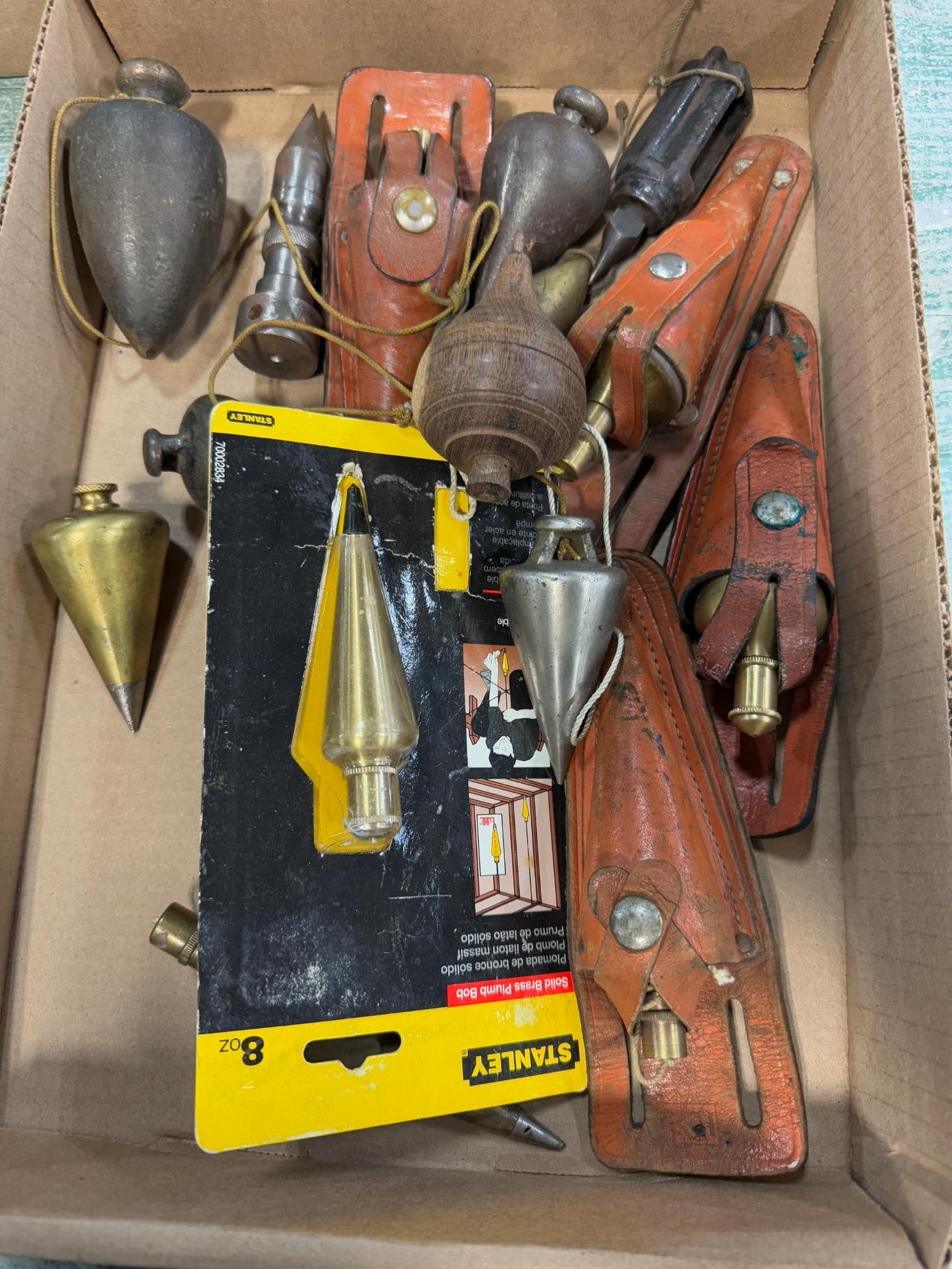 Flat lot of asst plumb bobs and pouches (1 of 5)