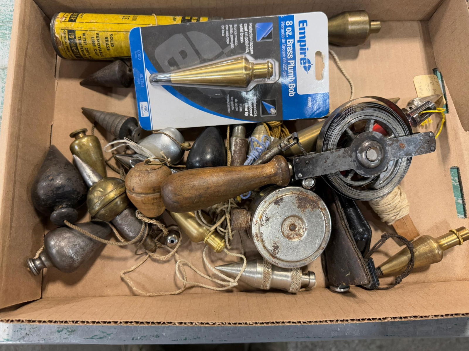 Flat lot of asst plumb bobs, surveyor tape and line (1 of 5)