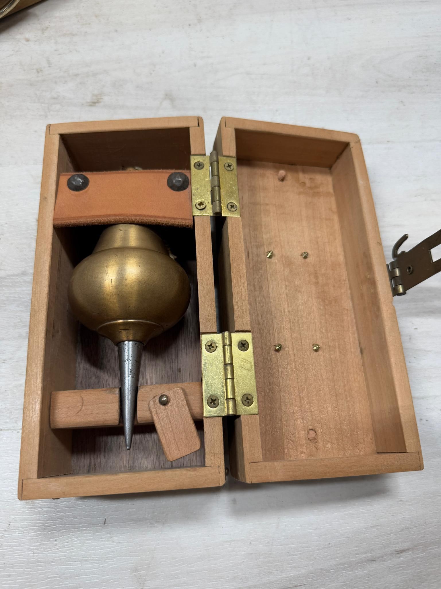 Inverted onion plumb bob in wooden storage box: Load-out Pick up for all online purchases for Antiques & collectibles is Monday, Tuesday, Wednesday, February 17th, 18th, 19th At our warehouse location. We do offer shipping on all items shippabl