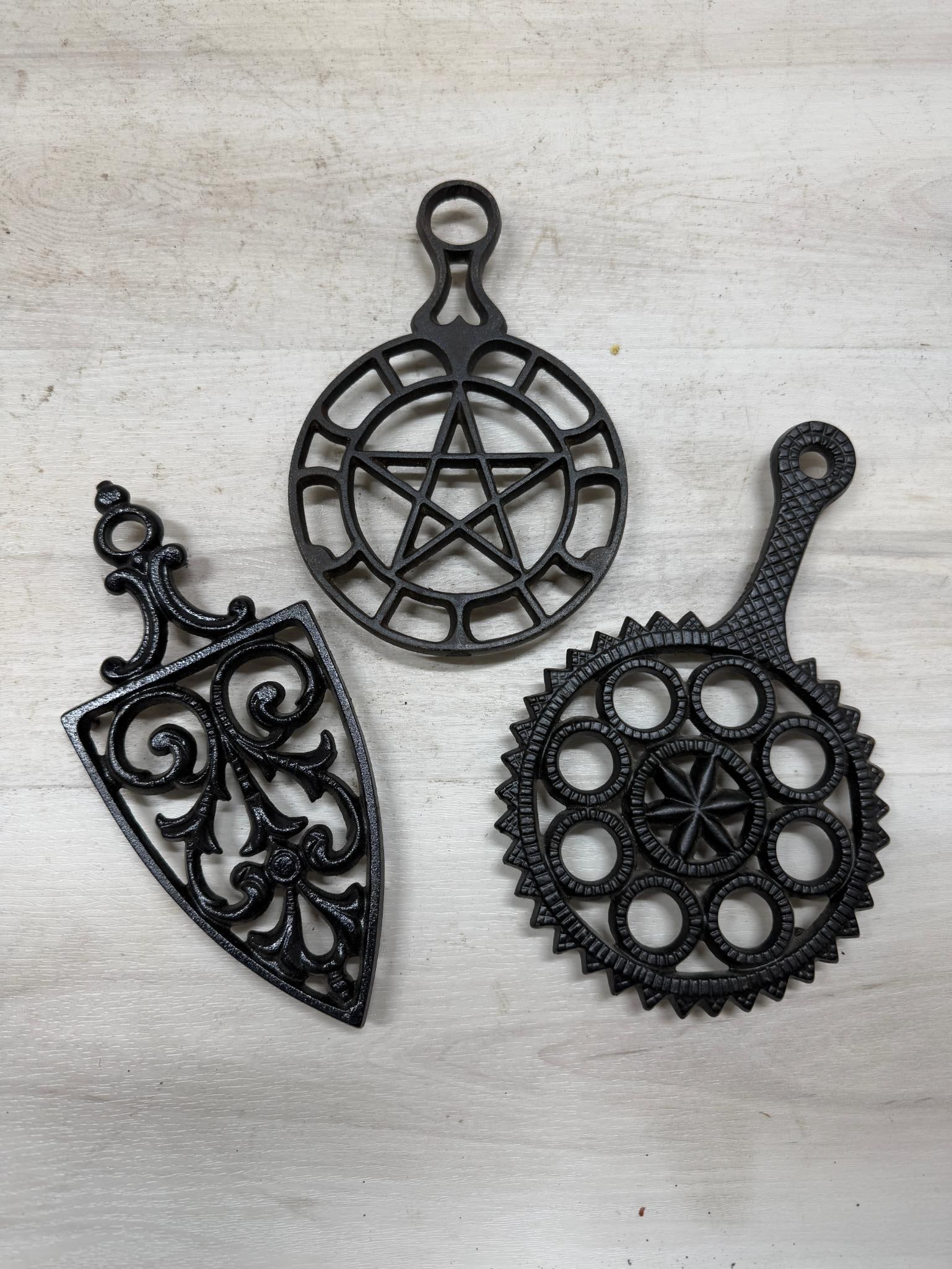 3- Griswold Marked Cast Iron trivets: Load-out Pick up for all online purchases for Antiques & collectibles is Monday, Tuesday, Wednesday, February 17th, 18th, 19th At our warehouse location. We do offer shipping on all items shippabl