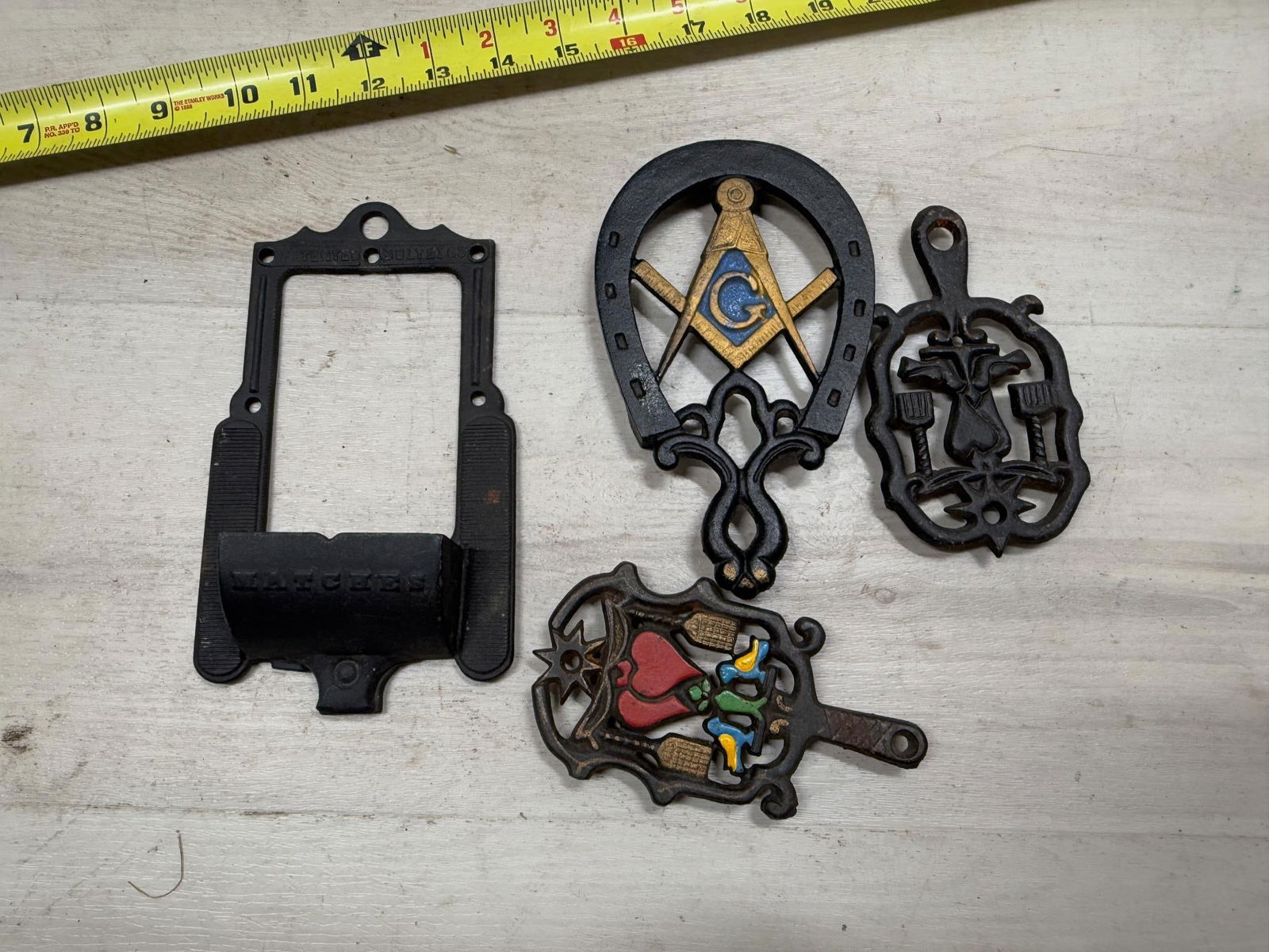 3- Cast Iron Trivets, including a Masonic version and Cast Iron Match holder: Load-out Pick up for all online purchases for Antiques & collectibles is Monday, Tuesday, Wednesday, February 17th, 18th, 19th At our warehouse location. We do offer shipping on all items shippabl