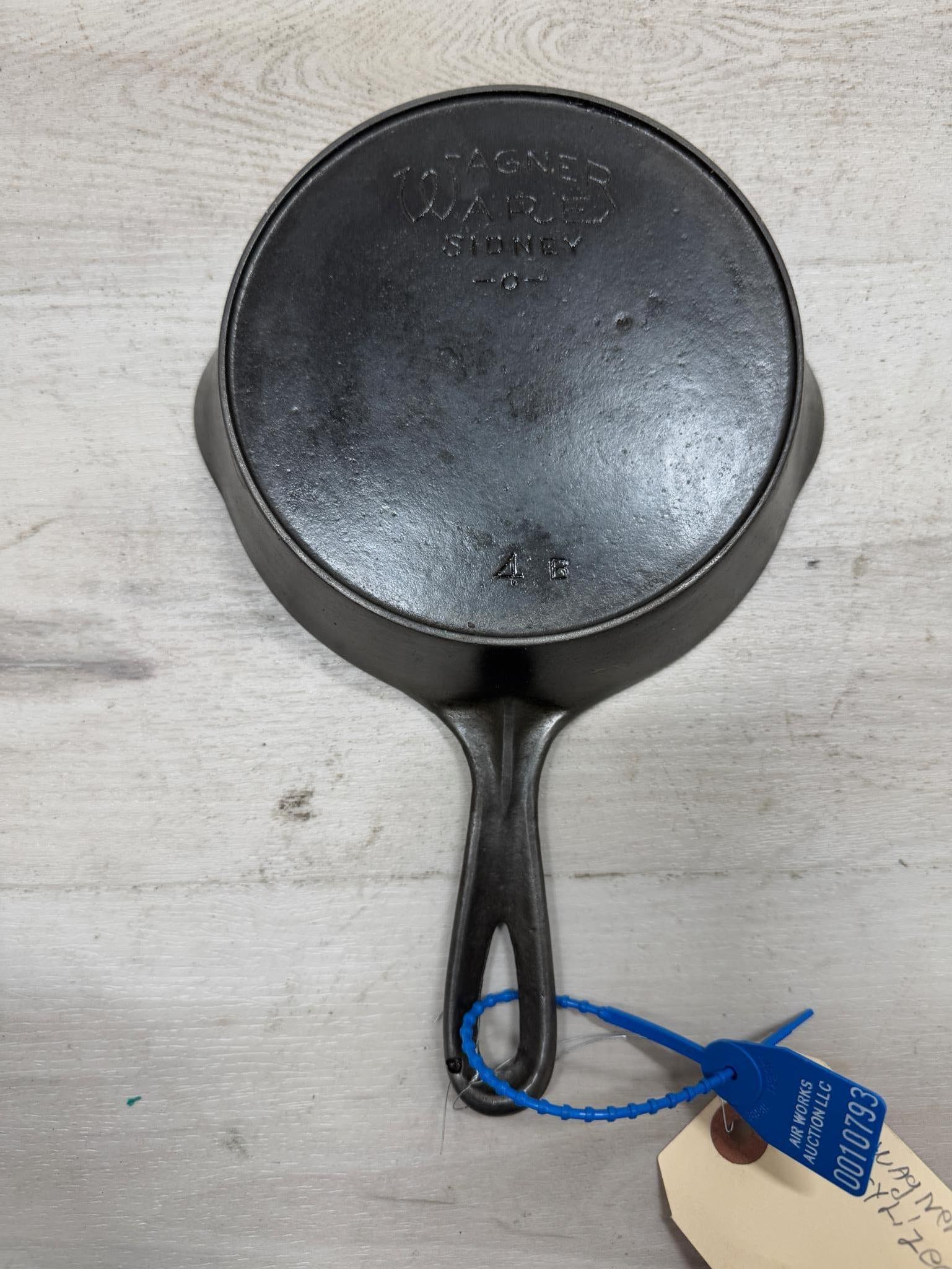 #4 Wagner ware stylized logo Cast Iron skillet w/ heat ring: Load-out Pick up for all online purchases for Antiques & collectibles is Monday, Tuesday, Wednesday, February 17th, 18th, 19th At our warehouse location. We do offer shipping on all items shippabl