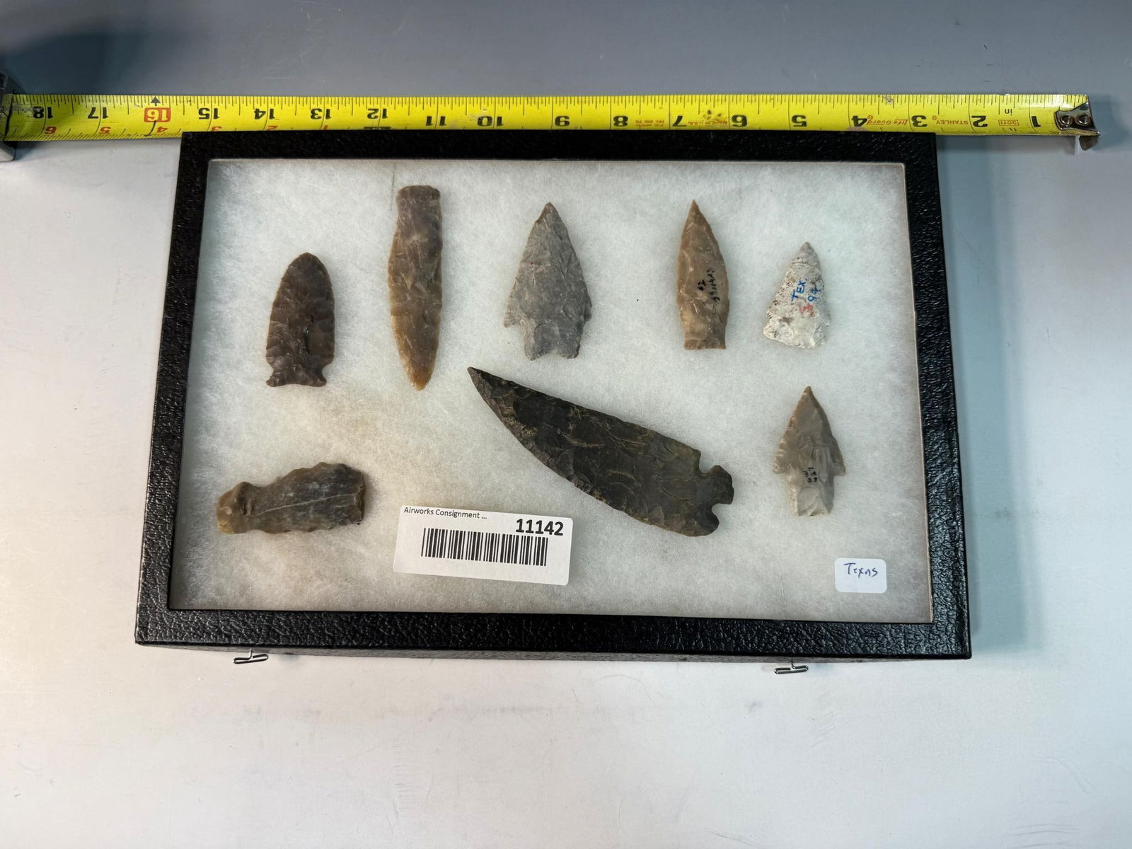 Frame of Texas artifacts. Largest measures 4 1/2" , 8 artifacts in frame. (1 of 3)
