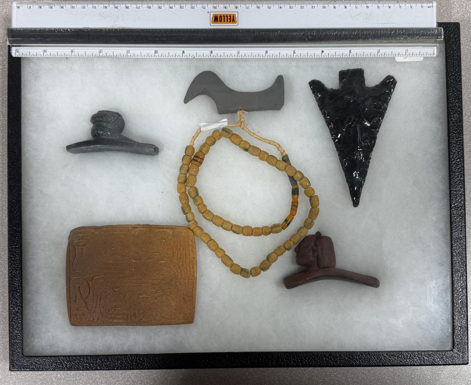 Frame of quality Reproductions and Trade Beads (1 of 4)