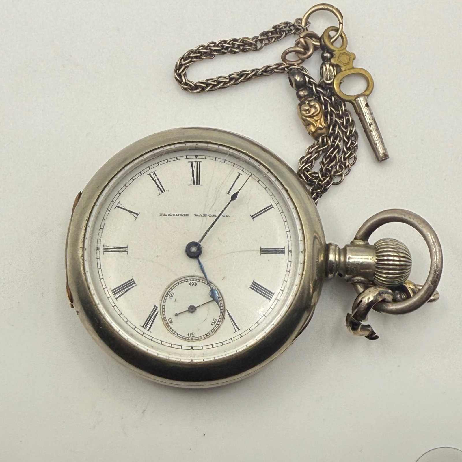 Illinois Watch Co. Grade 3 Pocket Watch, Year 1886, 11 Jewels, Key Winding, SN 632239: Illinois Watch Co. Grade 3 Pocket Watch, made in Springfield, Illinois, 1886, 11 jewels, mechanical movement, hunting configuration, single-sunk dial, silveroid case, 2,000 produced, chain with key in