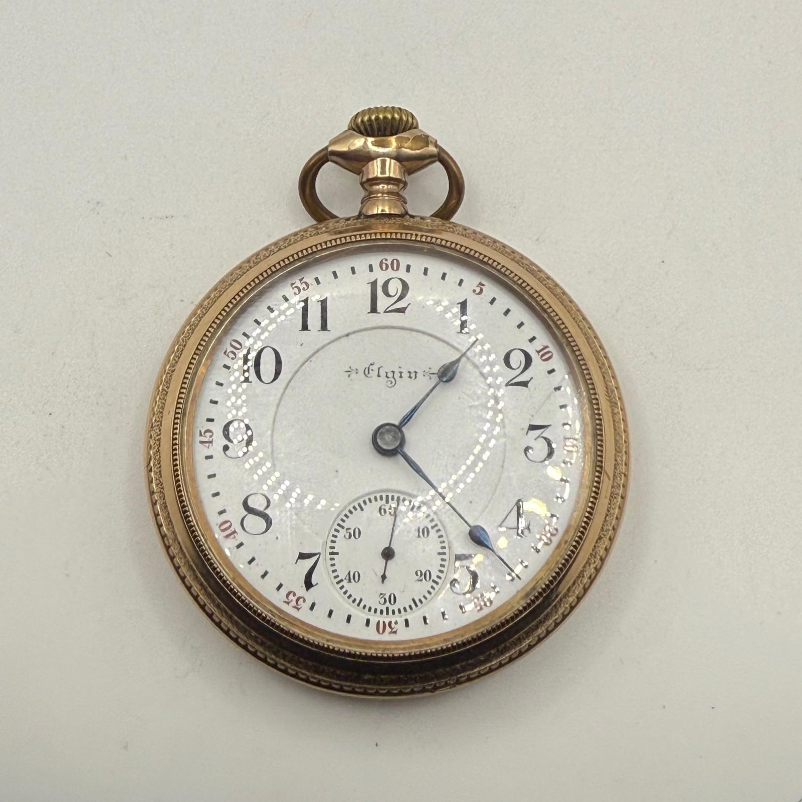 Elgin Model 5 Pocket Watch, Serial No. 7875566, 21 Jewels, Year 1899, SN 7875566: Discover the Elgin Model 5 Pocket Watch, an exquisite timepiece from 1899, featuring a mechanical manual winding movement, gold-filled case, Arabic numerals with a seconds subdial, pendant-set and lev