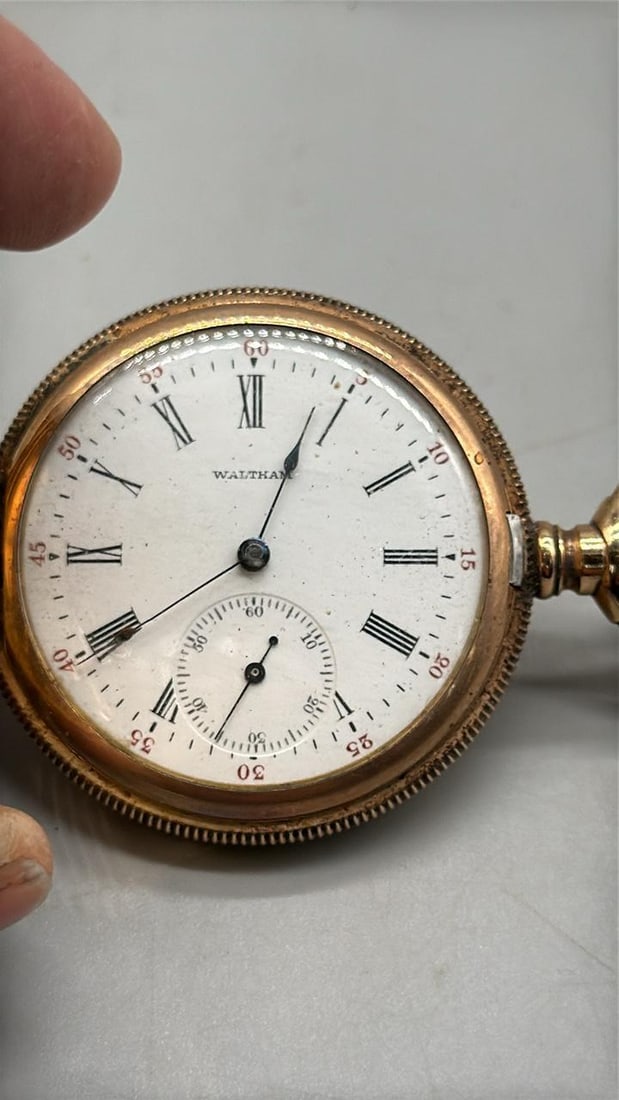 Waltham Special Pocket Watch, 1890, Mechanical, 12j, Gold Case, Serial 8804457: This Waltham Special Pocket Watch features a mechanical movement, 12 jewels, a gold case, a white dial with Roman numerals, a hunting configuration, a two-tone movement finish, and a Breguet hairsprin