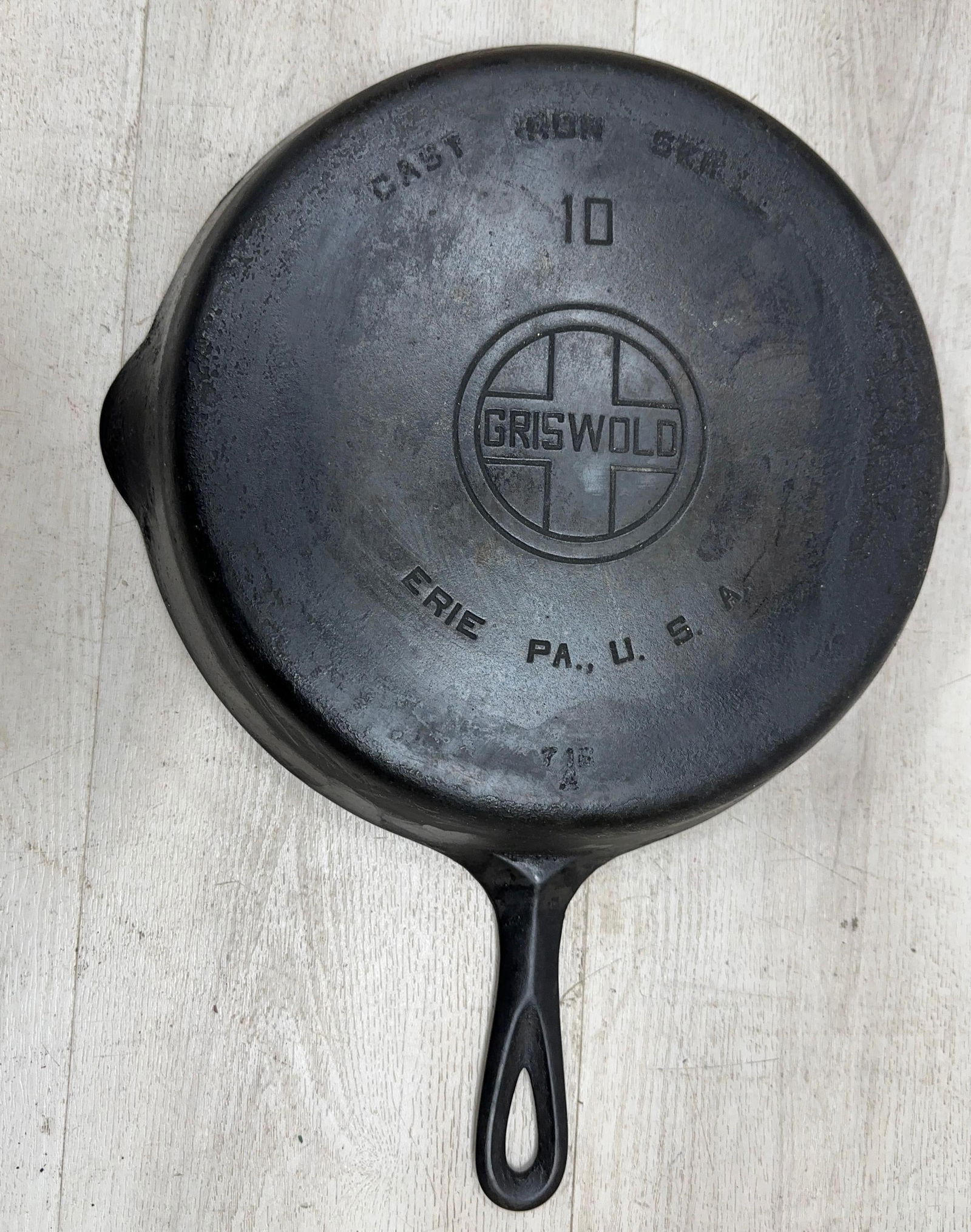 GRISWOLD NO. 10 LARGE LOGO. HAS WARP AND SPINS: Load-out Pick up for all online purchases for Antiques & collectibles is Monday, Tuesday, Wednesday, February 23rd, 24th, 25th At our shipper's location. We do offer shipping on all items shippable wi