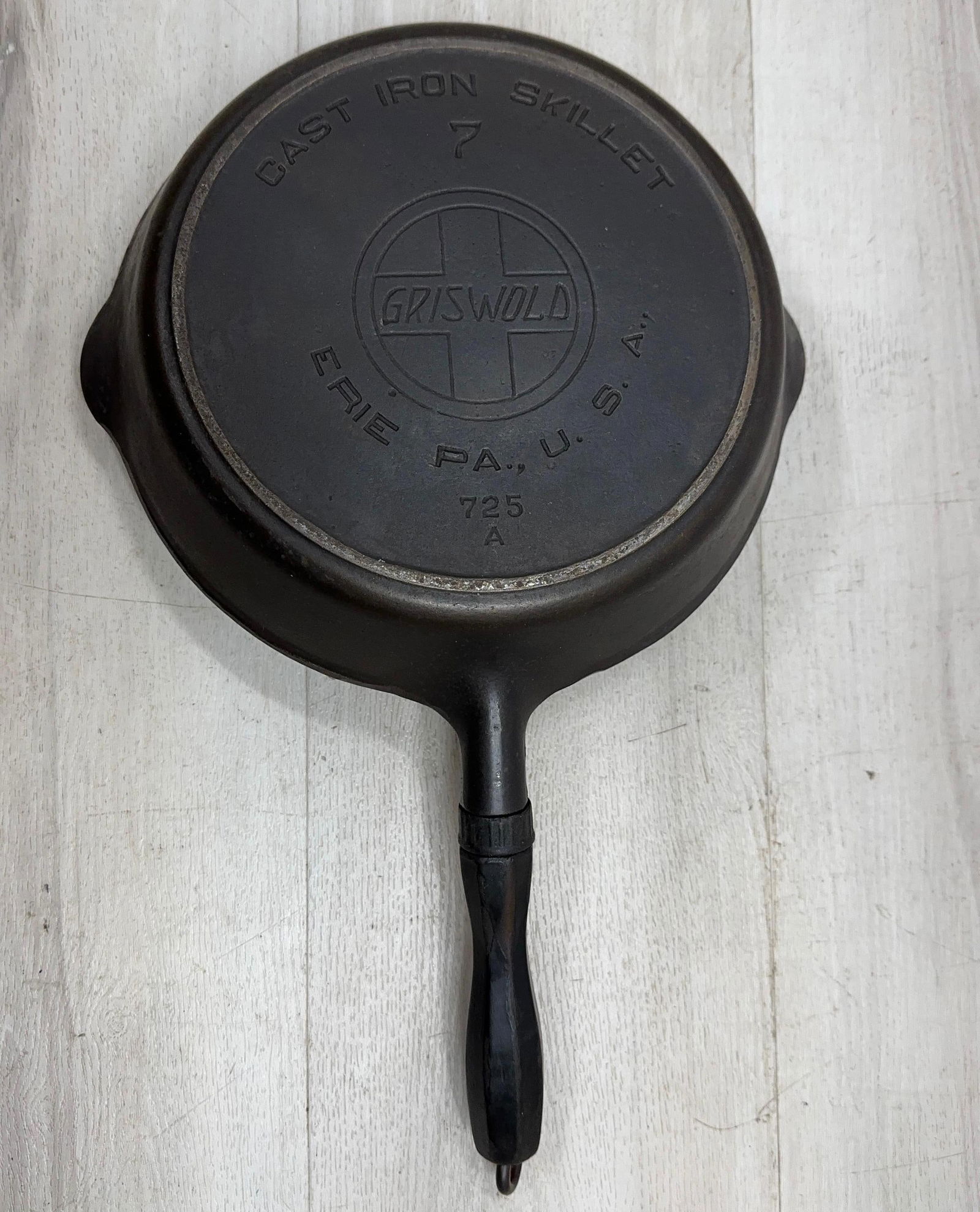 EARLY GRISWOLD NO. 7 WITH WOOD HANDLE: Load-out Pick up for all online purchases for Antiques & collectibles is Monday, Tuesday, Wednesday, February 23rd, 24th, 25th At our shipper's location. We do offer shipping on all items shippable wi