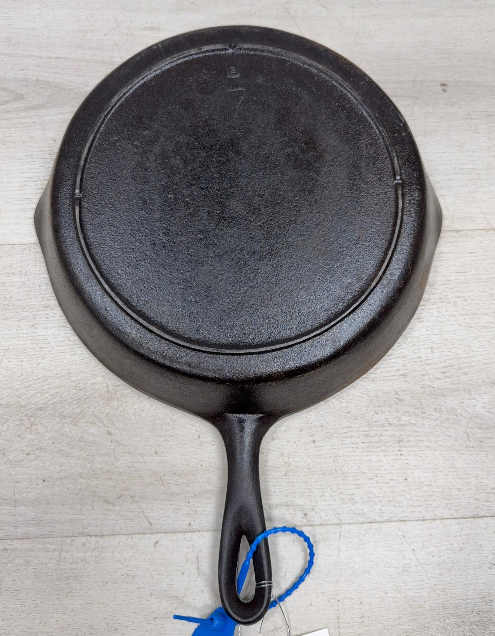 CAST IRON NO. 7 UNMARKED W/ HEAT RING: Load-out Pick up for all online purchases for Antiques & collectibles is Monday, Tuesday, Wednesday, February 23rd, 24th, 25th At our shipper's location. We do offer shipping on all items shippable wi