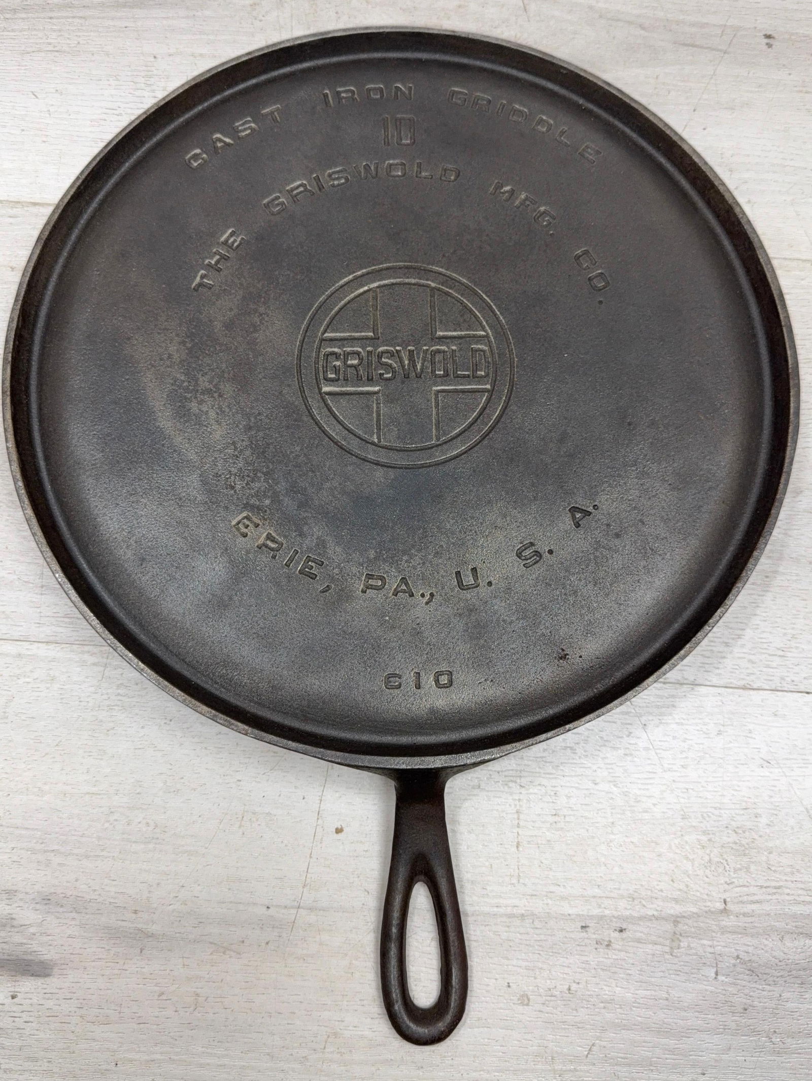 GRISWOLD #10 LBL CAST IRON HANDLED GRIDDLE: Load-out Pick up for all online purchases for Antiques & collectibles is Monday, Tuesday, Wednesday, February 23rd, 24th, 25th At our shipper's location. We do offer shipping on all items shippable wi