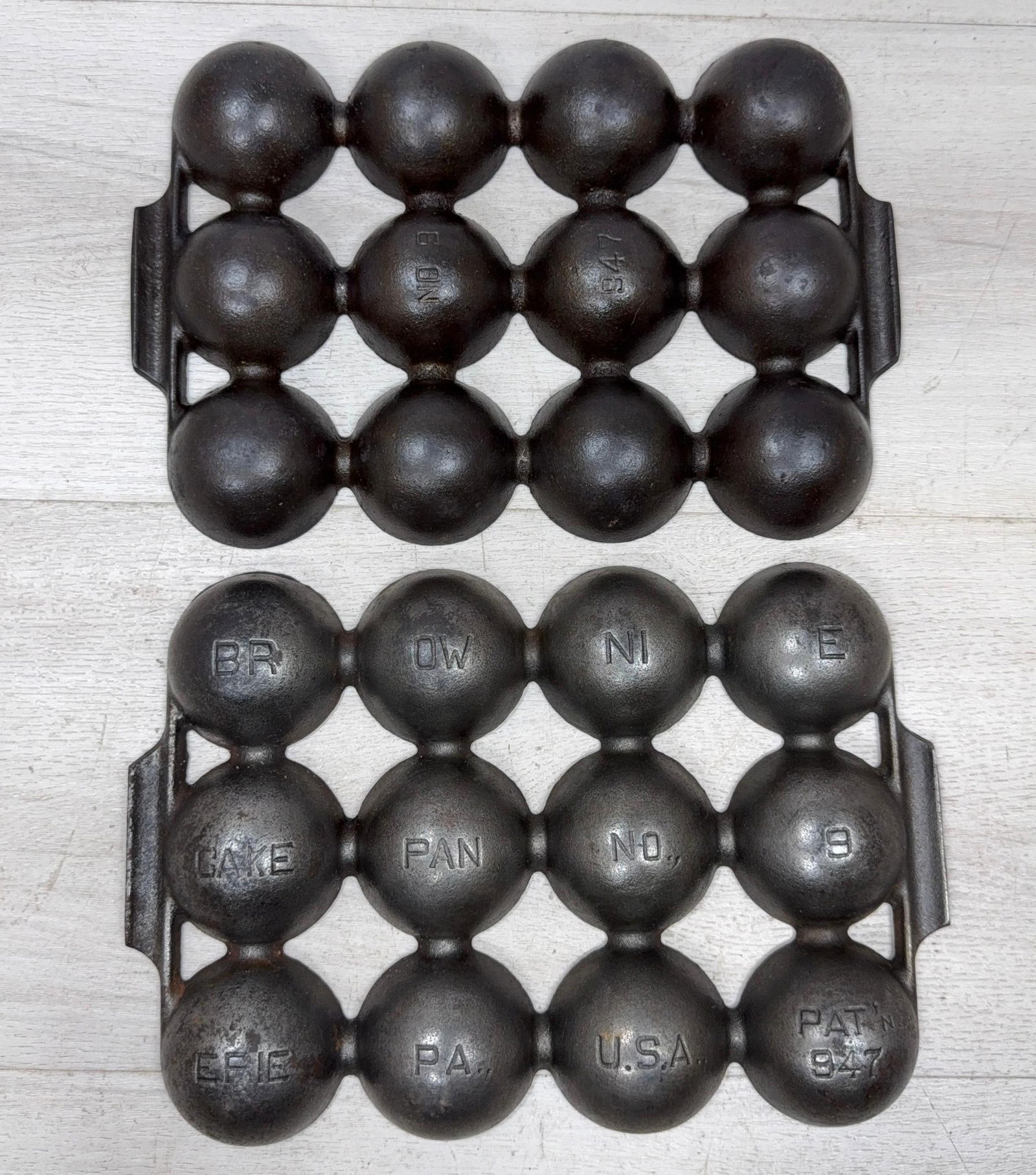 PAIR OF GRISWOLD #9 CAST IRON GOLF BALL PANS: Load-out Pick up for all online purchases for Antiques & collectibles is Monday, Tuesday, Wednesday, February 23rd, 24th, 25th At our shipper's location. We do offer shipping on all items shippable wi