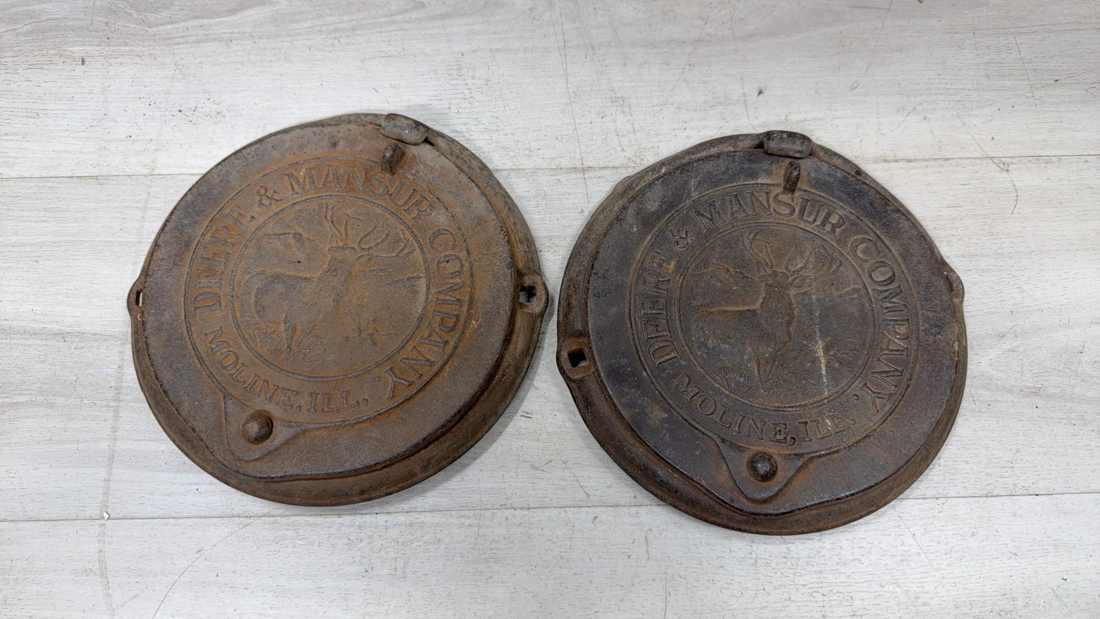 PAIR OF JOHN DEERE CAST IRON PLANTER LIDS: Load-out Pick up for all online purchases for Antiques & collectibles is Monday, Tuesday, Wednesday, February 23rd, 24th, 25th At our shipper's location. We do offer shipping on all items shippable wi