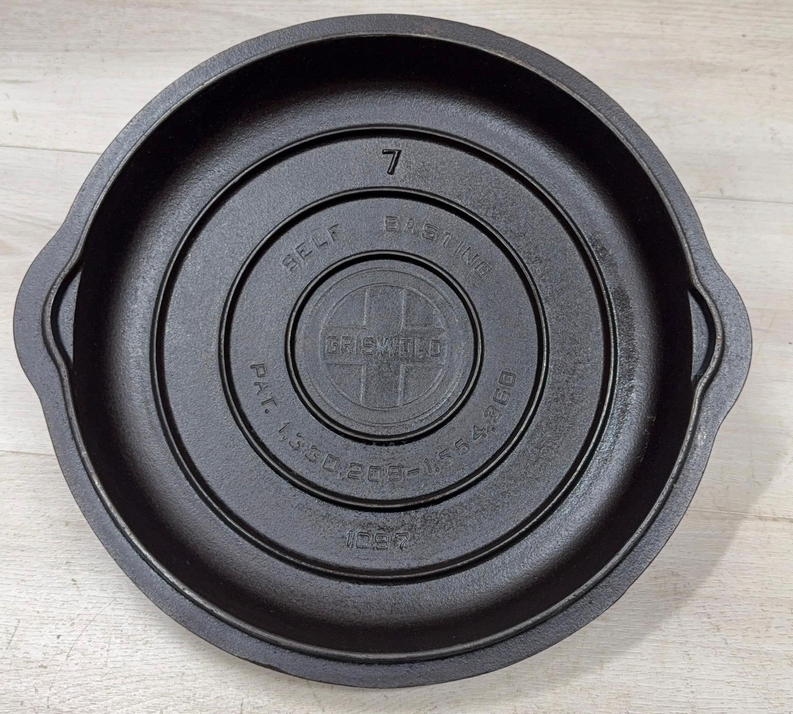 GRISWOLD #7 LARGE LOGO SMOOTH TOP CAST IRON SKILLET LID: Load-out Pick up for all online purchases for Antiques & collectibles is Monday, Tuesday, Wednesday, February 23rd, 24th, 25th At our shipper's location. We do offer shipping on all items shippable wi