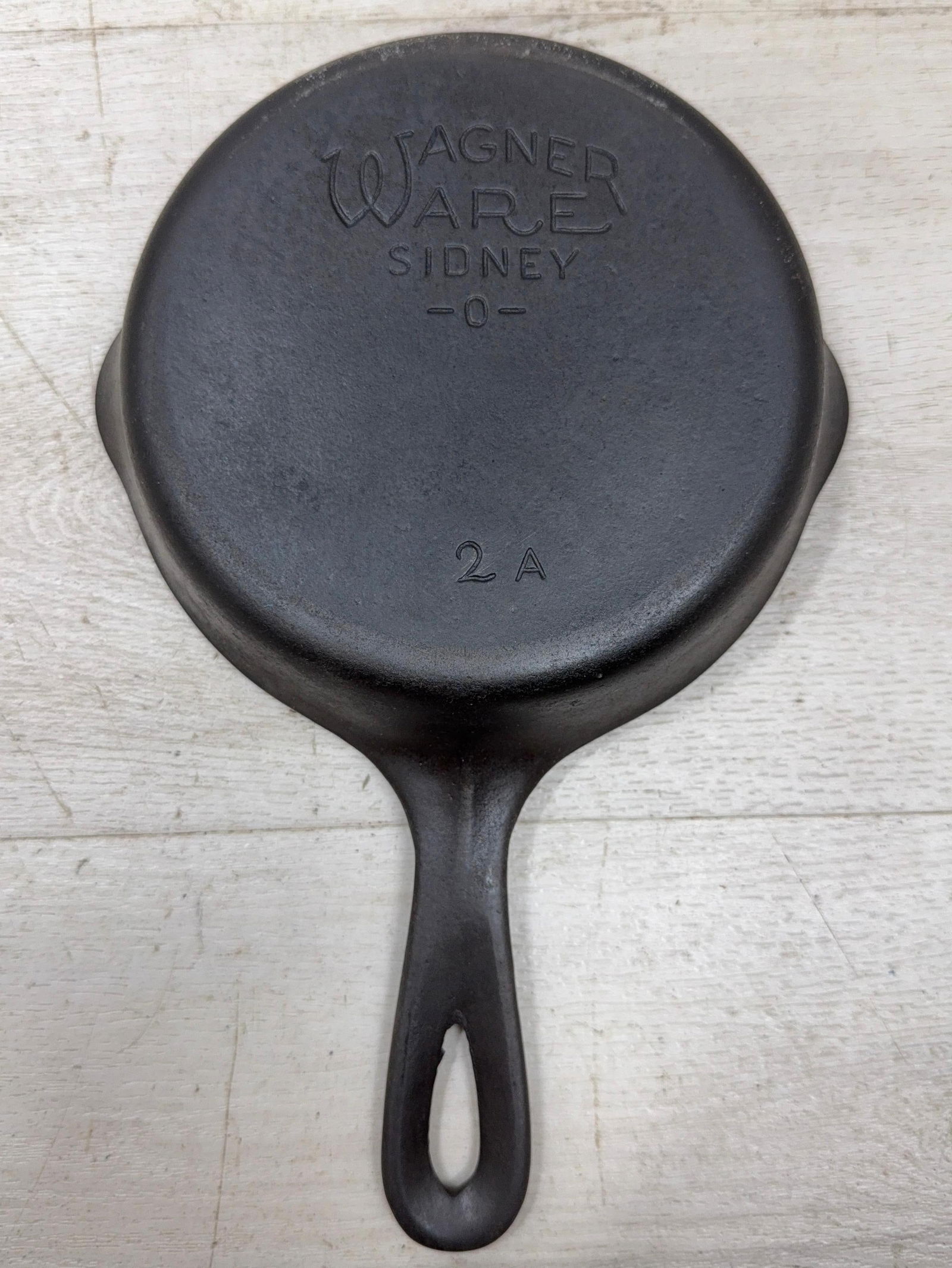 WAGNER WARE #2A SMOOTH BOTTOM CAST IRON SKILLET: Load-out Pick up for all online purchases for Antiques & collectibles is Monday, Tuesday, Wednesday, February 23rd, 24th, 25th At our shipper's location. We do offer shipping on all items shippable wi
