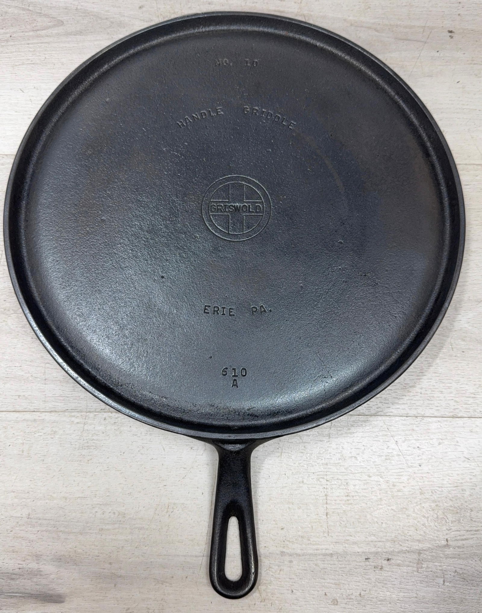 GRISWOLD #10 SMALL LOGO HANDLED GRIDDLE, HARD TO FIND SIZE: Load-out Pick up for all online purchases for Antiques & collectibles is Monday, Tuesday, Wednesday, February 23rd, 24th, 25th At our shipper's location. We do offer shipping on all items shippable wi