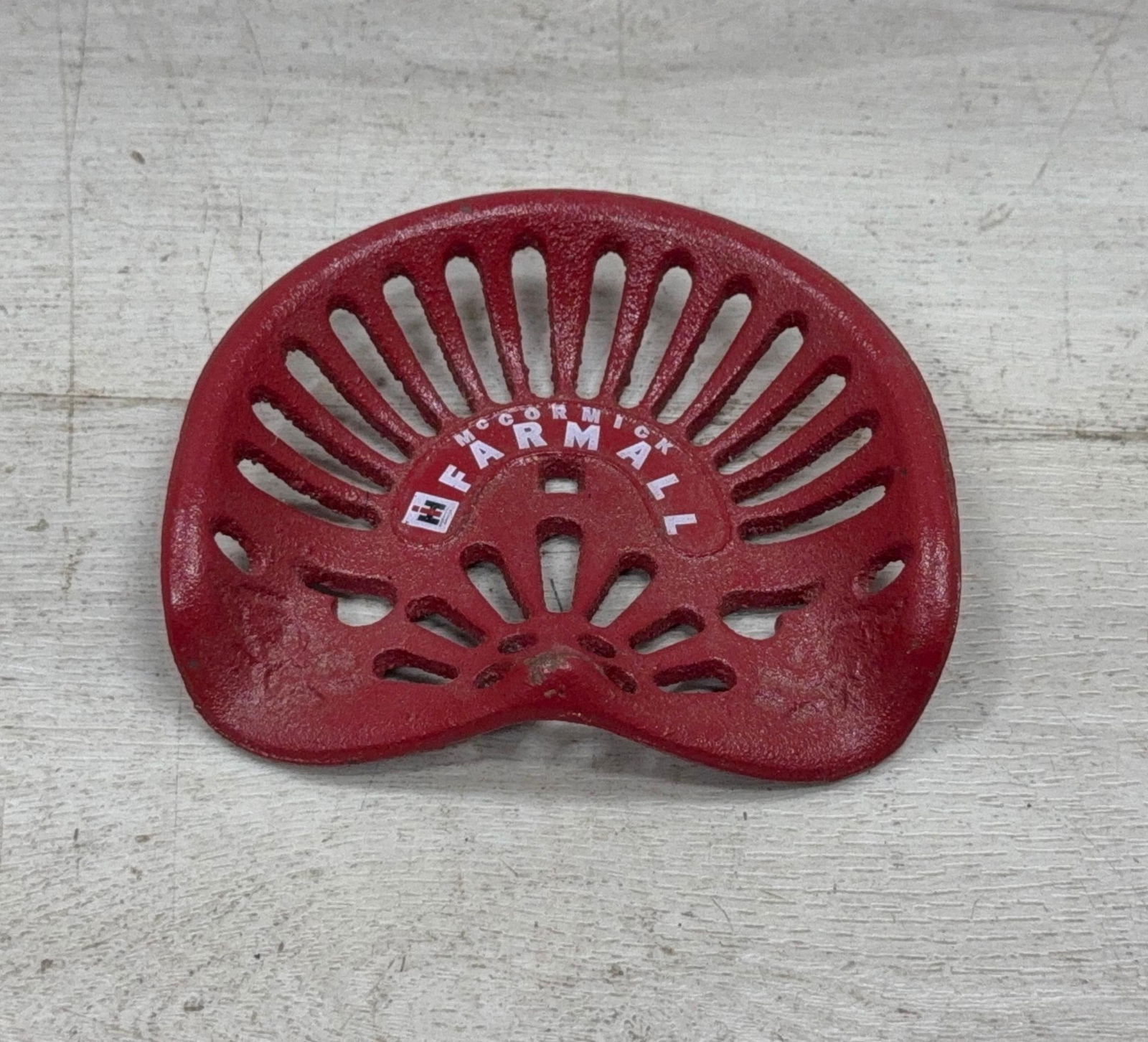 FARMALL MODEL CAST IRON SEAT (1 of 4)