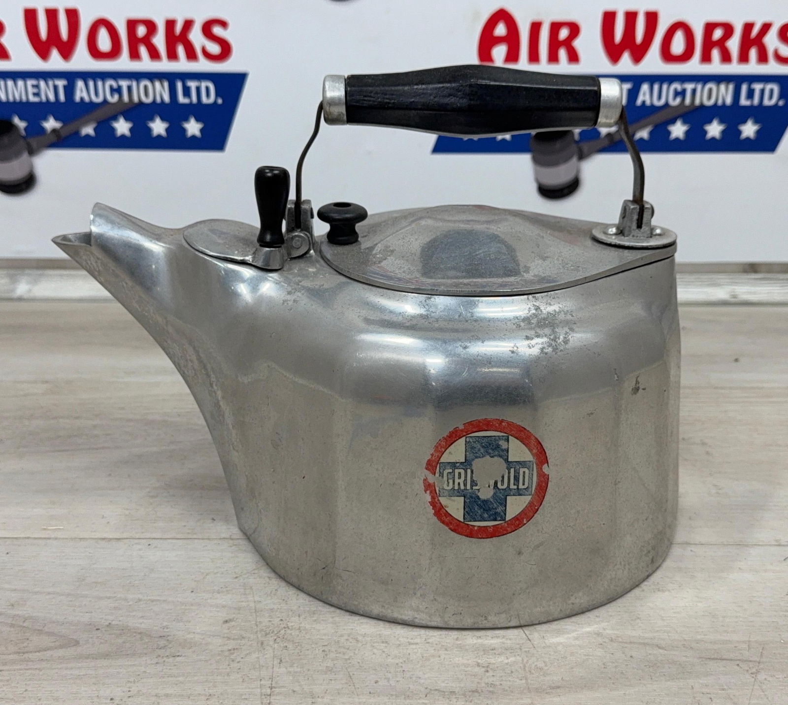 GRISWOLD 4 QT. CAST ALUMINUM TEAPOT: Load-out Pick up for all online purchases for Antiques & collectibles is Monday, Tuesday, Wednesday, February 23rd, 24th, 25th At our shipper's location. We do offer shipping on all items shippable wi