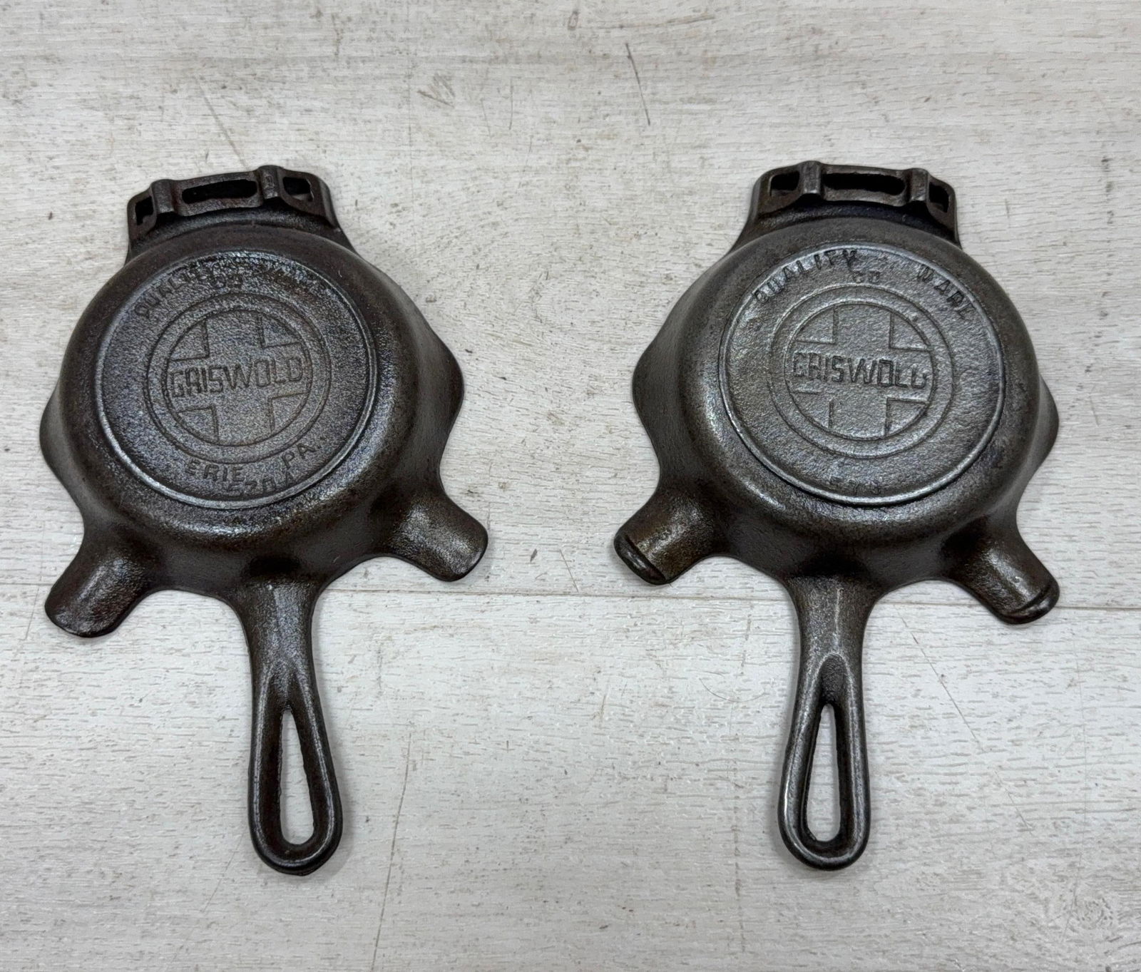 PAIR OF GRISWOLD 00 ASH TRAYS (1 of 6)