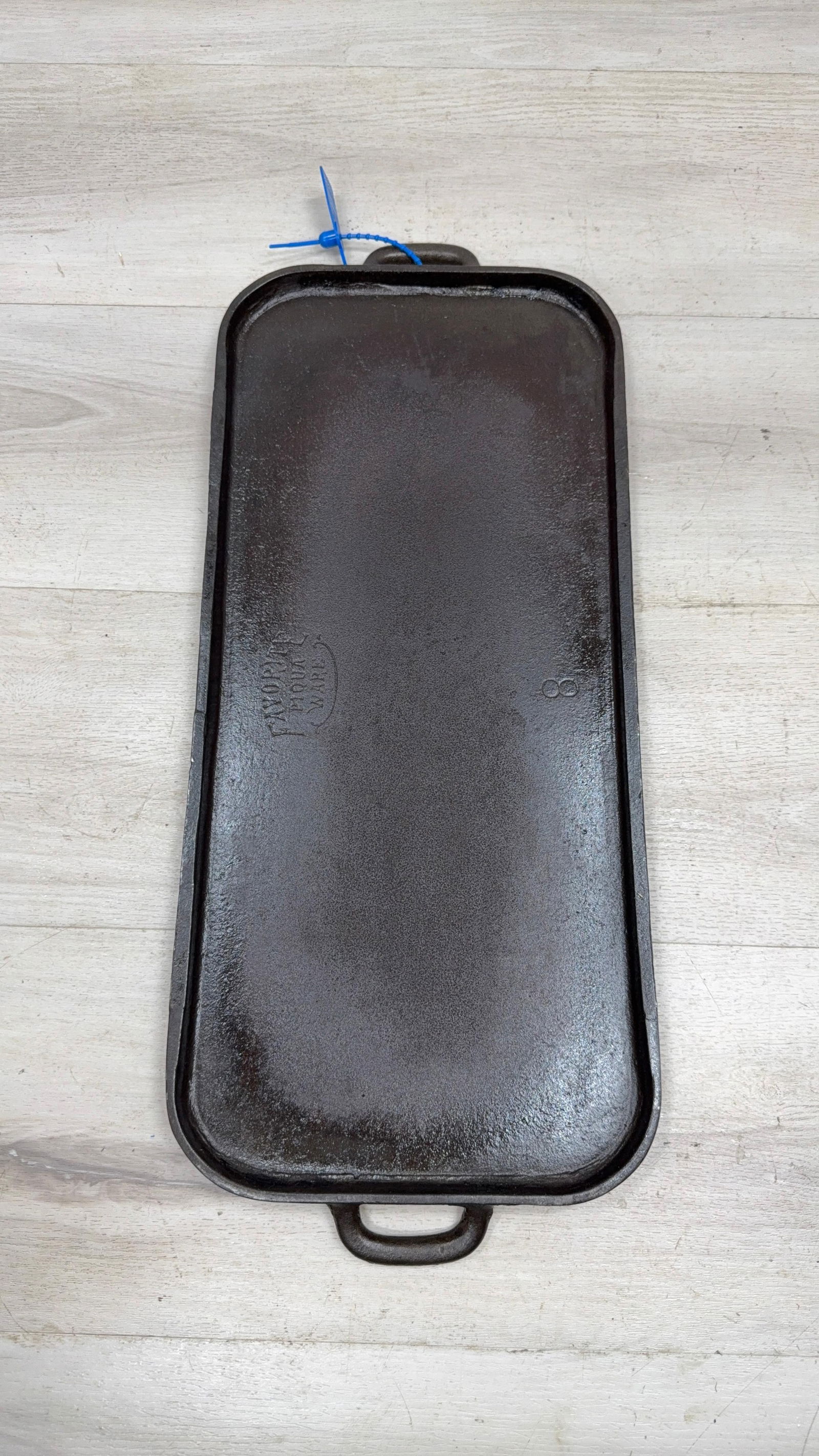 FAVORITE NO. 8 GRIDDLE PIQUA WARE. SITS FLAT: Load-out Pick up for all online purchases for Antiques & collectibles is Monday, Tuesday, Wednesday, February 23rd, 24th, 25th At our shipper's location. We do offer shipping on all items shippable