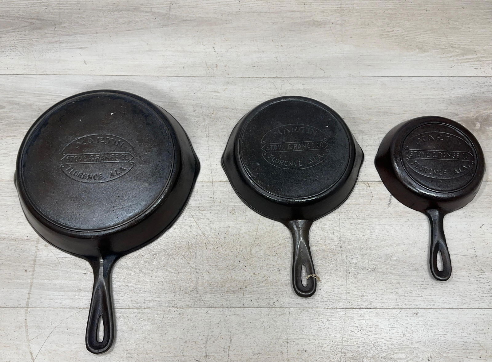 SET OF (3) THREE MARTIN SKILLETS. NO'S 3,5 AND 8: Load-out Pick up for all online purchases for Antiques & collectibles is Monday, Tuesday, Wednesday, February 23rd, 24th, 25th At our shipper's location. We do offer shipping on all items shippable wi
