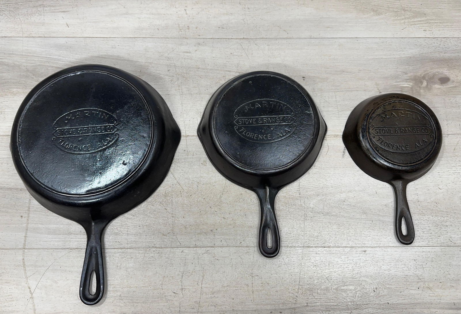 SET OF (3) THREE MARTIN SKILLETS. NO'S 3,5 AND 8: Load-out Pick up for all online purchases for Antiques & collectibles is Monday, Tuesday, Wednesday, February 23rd, 24th, 25th At our shipper's location. We do offer shipping on all items shippable wi