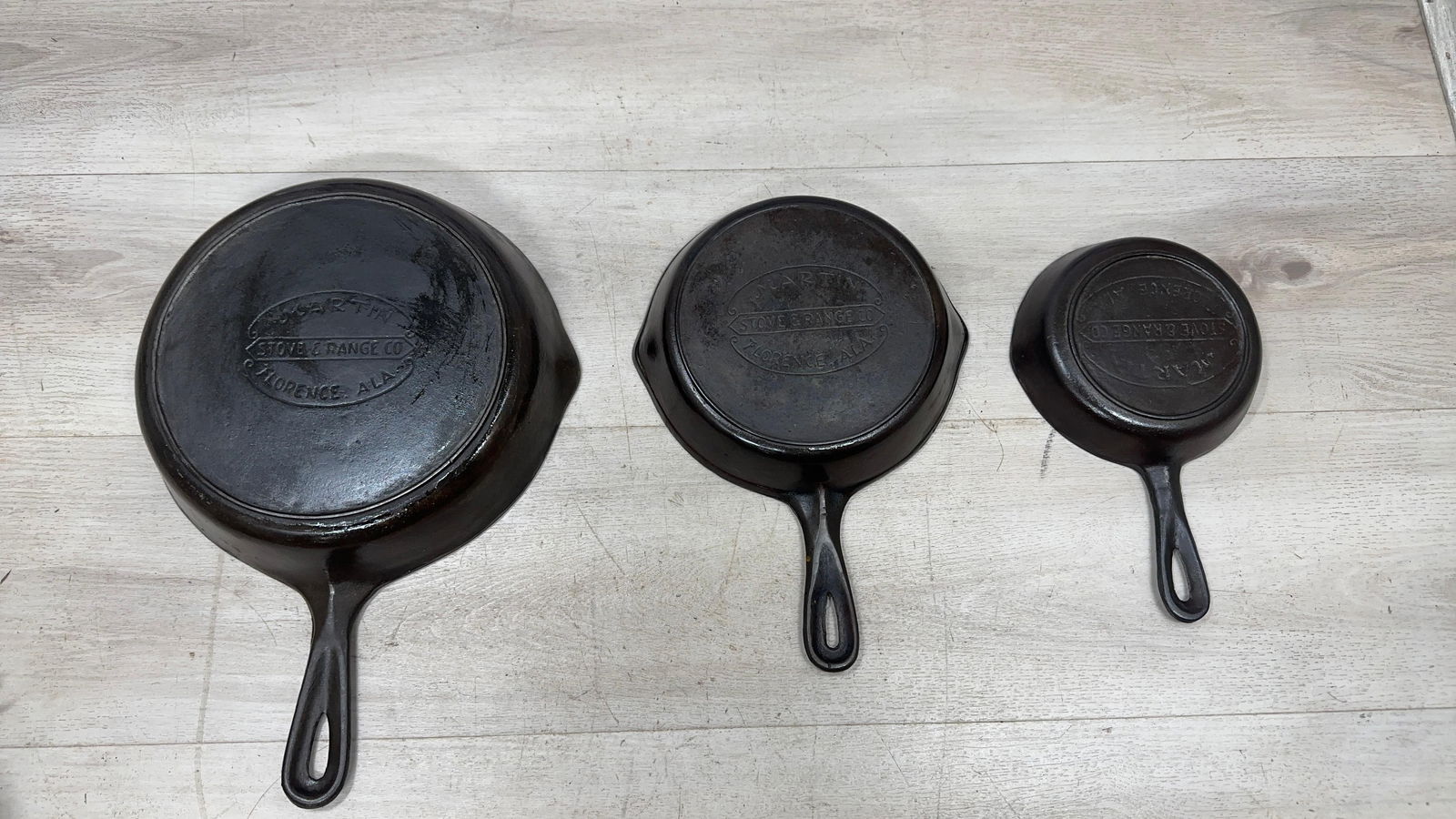 SET OF (3) THREE MARTIN SKILLETS. NO'S 3,5 AND 8: Load-out Pick up for all online purchases for Antiques & collectibles is Monday, Tuesday, Wednesday, February 23rd, 24th, 25th At our shipper's location. We do offer shipping on all items shippable wi
