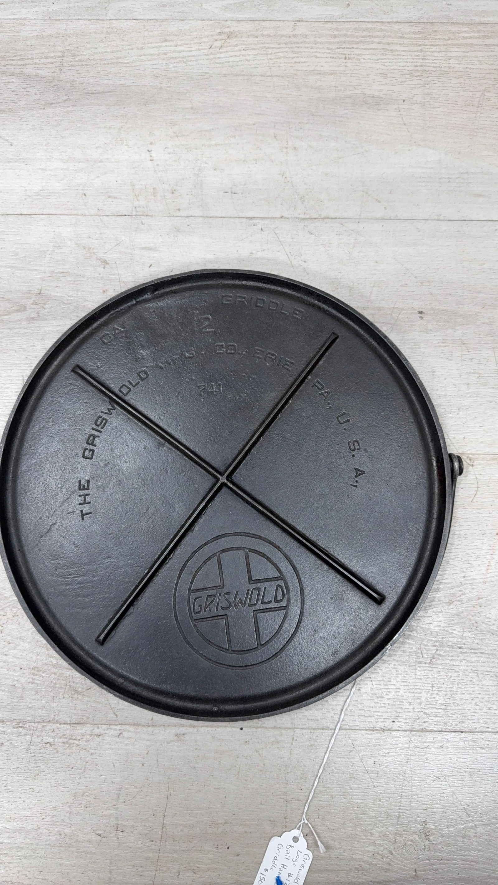 GRISWOLD NO. 12 BAILED ROUND GRIDDLE SLANT LOGO: Load-out Pick up for all online purchases for Antiques & collectibles is Monday, Tuesday, Wednesday, February 23rd, 24th, 25th At our shipper's location. We do offer shipping on all items shippable wi