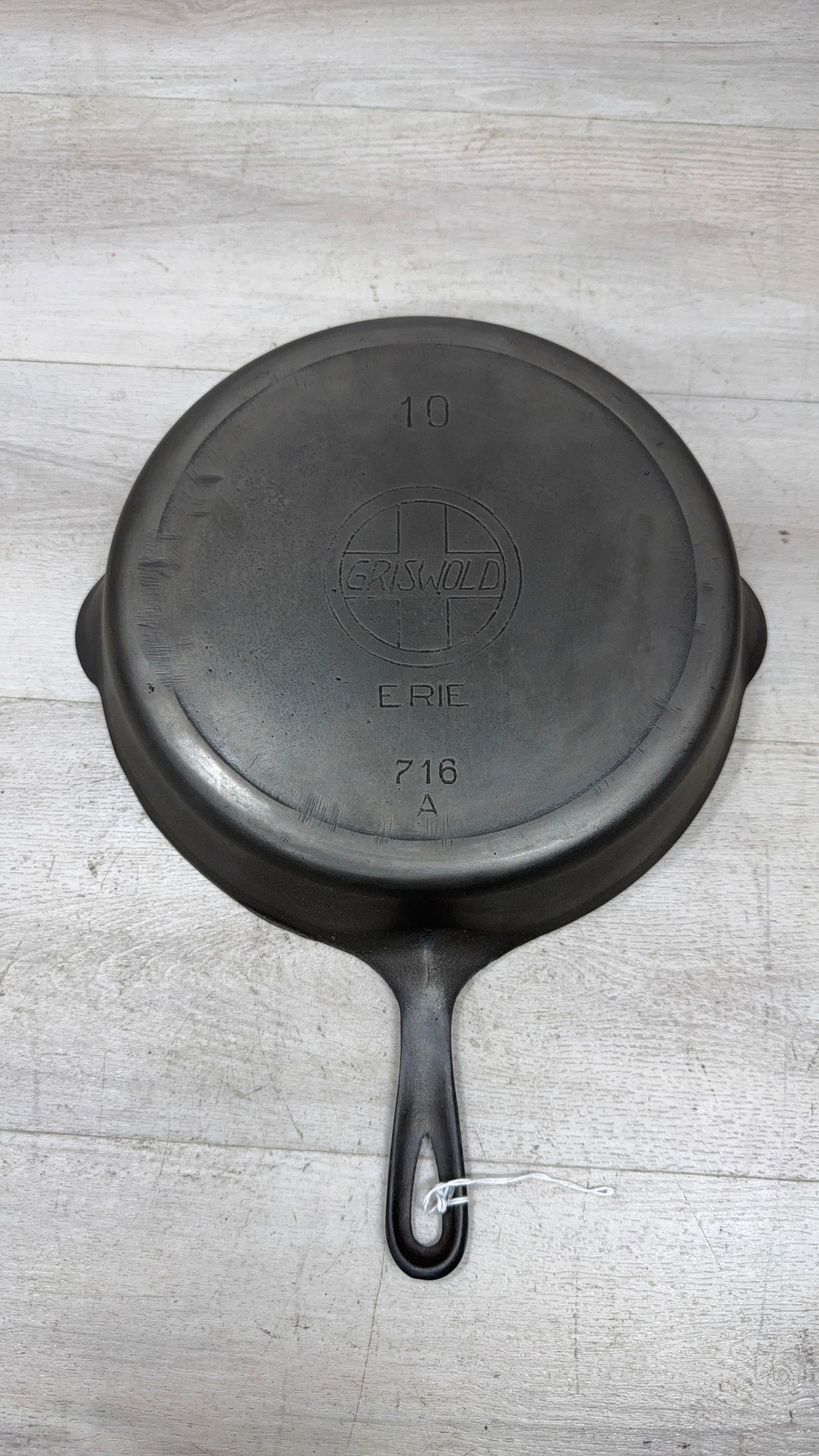 GRISWOLD NO. 10 SLANT "ERIE" SKILLET W/HEAT RING: Load-out Pick up for all online purchases for Antiques & collectibles is Monday, Tuesday, Wednesday, February 23rd, 24th, 25th At our shipper's location. We do offer shipping on all items shippable