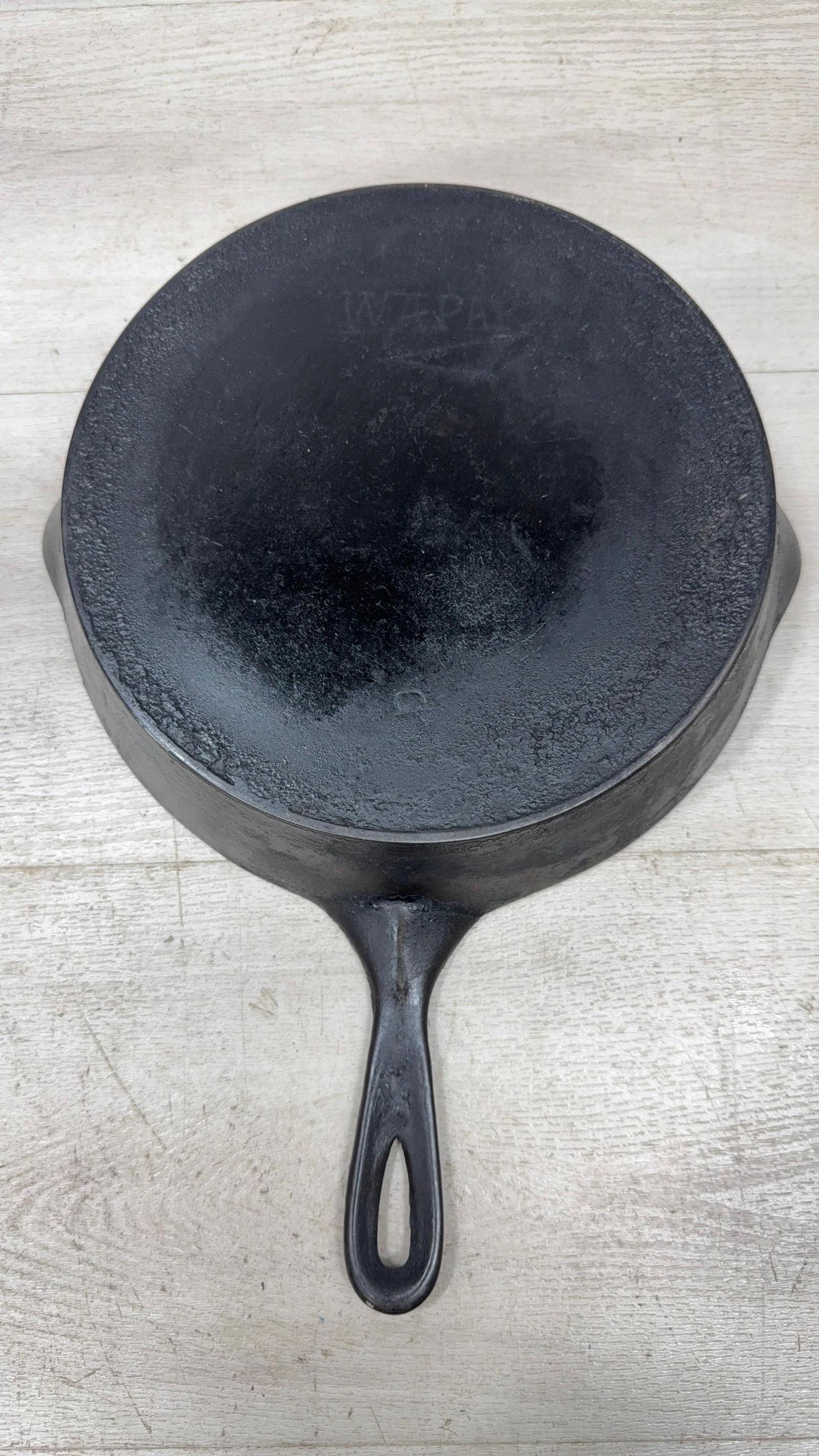WAPAK NO. 8 SKILLET W/HEAT RING: Load-out Pick up for all online purchases for Antiques & collectibles is Monday, Tuesday, Wednesday, February 23rd, 24th, 25th At our shipper's location. We do offer shipping on all items shippable wi