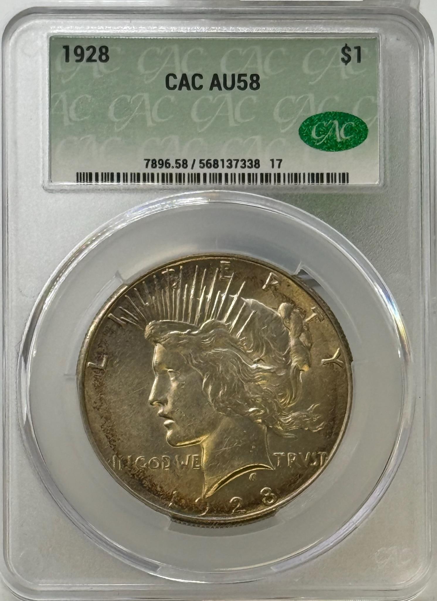 1928 Peace Dollar, $1 Coin, AU58, CAC Certified: IMPORTANT, WE ONLY ACCEPT CREDIT CARDS UP TO $500 FOR ONLINE COIN PURCHASES. YOU CAN PAY ACH THROUGH PROXIBID, OR YOU CAN SEND A WIRE OR CERTIFIED CHECK. WE WILL HOLD ALL SHIPPING OF COINS FOR 10 DAYS