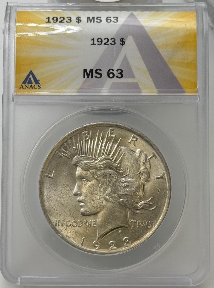 1923 Peace Dollar, MS 63, ANACS, Serial #7749851: IMPORTANT, WE ONLY ACCEPT CREDIT CARDS UP TO $500 FOR ONLINE COIN PURCHASES. YOU CAN PAY ACH THROUGH PROXIBID, OR YOU CAN SEND A WIRE OR CERTIFIED CHECK. WE WILL HOLD ALL SHIPPING OF COINS FOR 10 DAYS