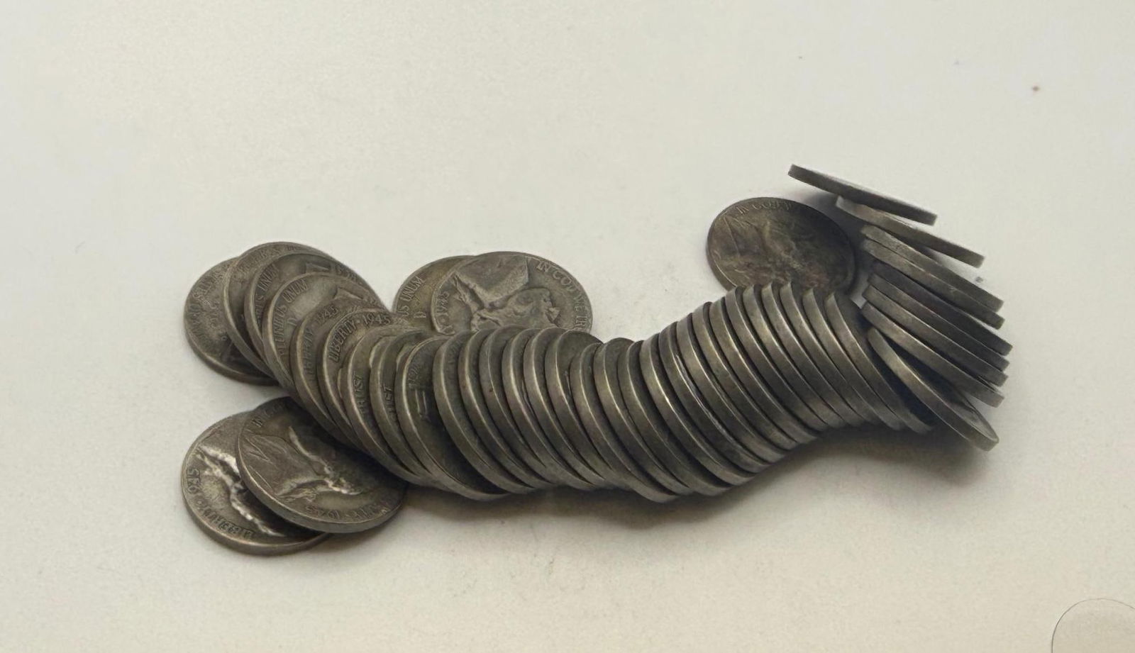 Tube of 40 35% Silver War Nickels: IMPORTANT, WE ONLY ACCEPT CREDIT CARDS UP TO $500 FOR ONLINE COIN PURCHASES. YOU CAN PAY ACH THROUGH PROXIBID, OR YOU CAN SEND A WIRE OR CERTIFIED CHECK. WE WILL HOLD ALL SHIPPING OF COINS FOR 10 DAYS