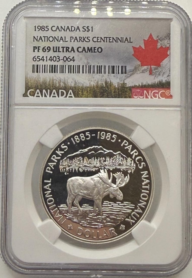 1985 Canada National Parks Centennial $1 Silver Coin, PF 69 Ultra Cameo: IMPORTANT, WE ONLY ACCEPT CREDIT CARDS UP TO $500 FOR ONLINE COIN PURCHASES. YOU CAN PAY ACH THROUGH PROXIBID, OR YOU CAN SEND A WIRE OR CERTIFIED CHECK. WE WILL HOLD ALL SHIPPING OF COINS FOR 10 DAYS