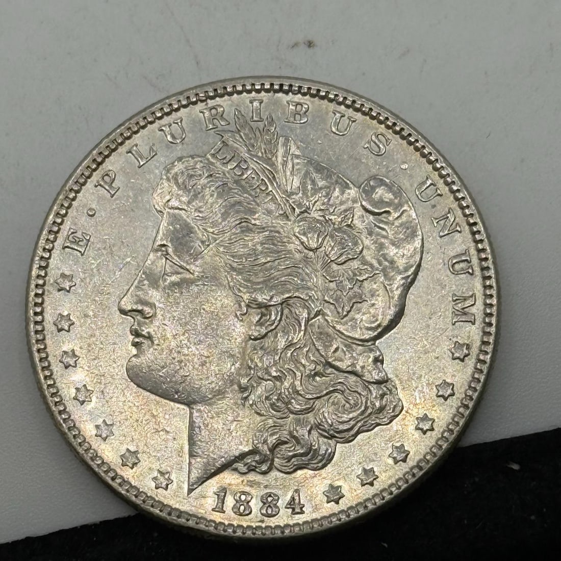 1884 Morgan Dollar Coin, United States, 90% Silver: IMPORTANT, WE ONLY ACCEPT CREDIT CARDS UP TO $500 FOR ONLINE COIN PURCHASES. YOU CAN PAY ACH THROUGH PROXIBID, OR YOU CAN SEND A WIRE OR CERTIFIED CHECK. WE WILL HOLD ALL SHIPPING OF COINS FOR 10 DAYS
