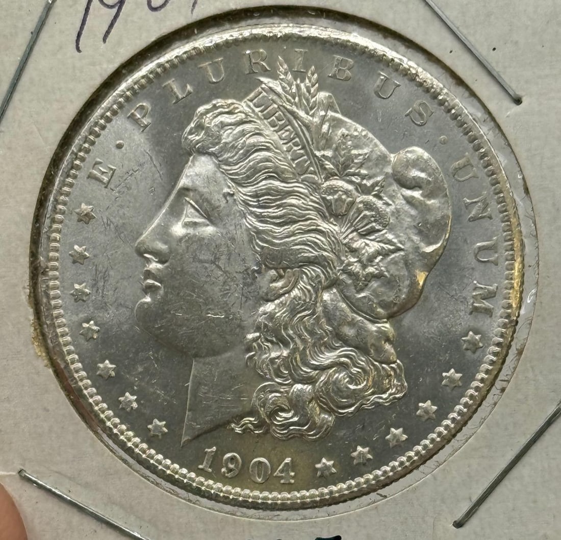 1904-O Morgan Dollar Coin, United States, 90% Silver: IMPORTANT, WE ONLY ACCEPT CREDIT CARDS UP TO $500 FOR ONLINE COIN PURCHASES. YOU CAN PAY ACH THROUGH PROXIBID, OR YOU CAN SEND A WIRE OR CERTIFIED CHECK. WE WILL HOLD ALL SHIPPING OF COINS FOR 10 DAYS