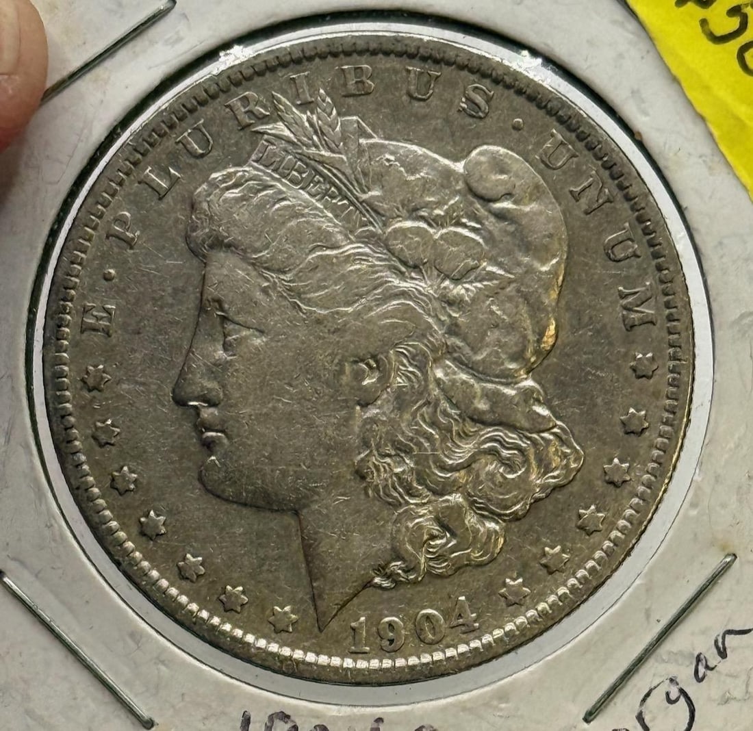 1904-O Morgan Dollar Coin, United States, 90% Silver: IMPORTANT, WE ONLY ACCEPT CREDIT CARDS UP TO $500 FOR ONLINE COIN PURCHASES. YOU CAN PAY ACH THROUGH PROXIBID, OR YOU CAN SEND A WIRE OR CERTIFIED CHECK. WE WILL HOLD ALL SHIPPING OF COINS FOR 10 DAYS
