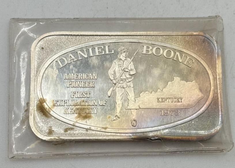 1973 Daniel Boone Commemorative Silver Bar, 1 Troy Ounce, .999+ Fine: IMPORTANT, WE ONLY ACCEPT CREDIT CARDS UP TO $500 FOR ONLINE COIN PURCHASES. YOU CAN PAY ACH THROUGH PROXIBID, OR YOU CAN SEND A WIRE OR CERTIFIED CHECK. WE WILL HOLD ALL SHIPPING OF COINS FOR 10 DAYS