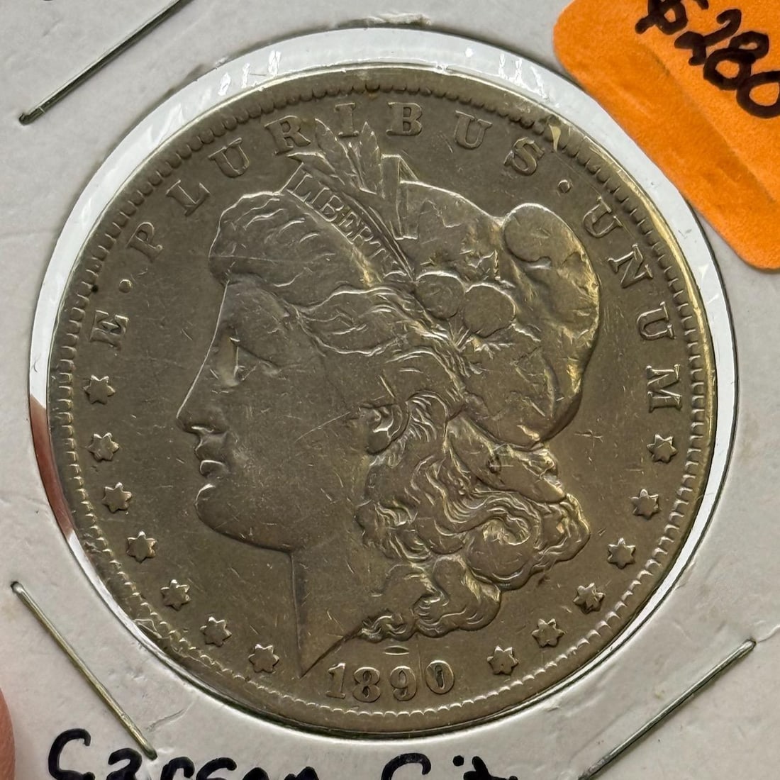1890-CC Morgan Dollar Coin, United States, 90% Silver: IMPORTANT, WE ONLY ACCEPT CREDIT CARDS UP TO $500 FOR ONLINE COIN PURCHASES. YOU CAN PAY ACH THROUGH PROXIBID, OR YOU CAN SEND A WIRE OR CERTIFIED CHECK. WE WILL HOLD ALL SHIPPING OF COINS FOR 10 DAYS
