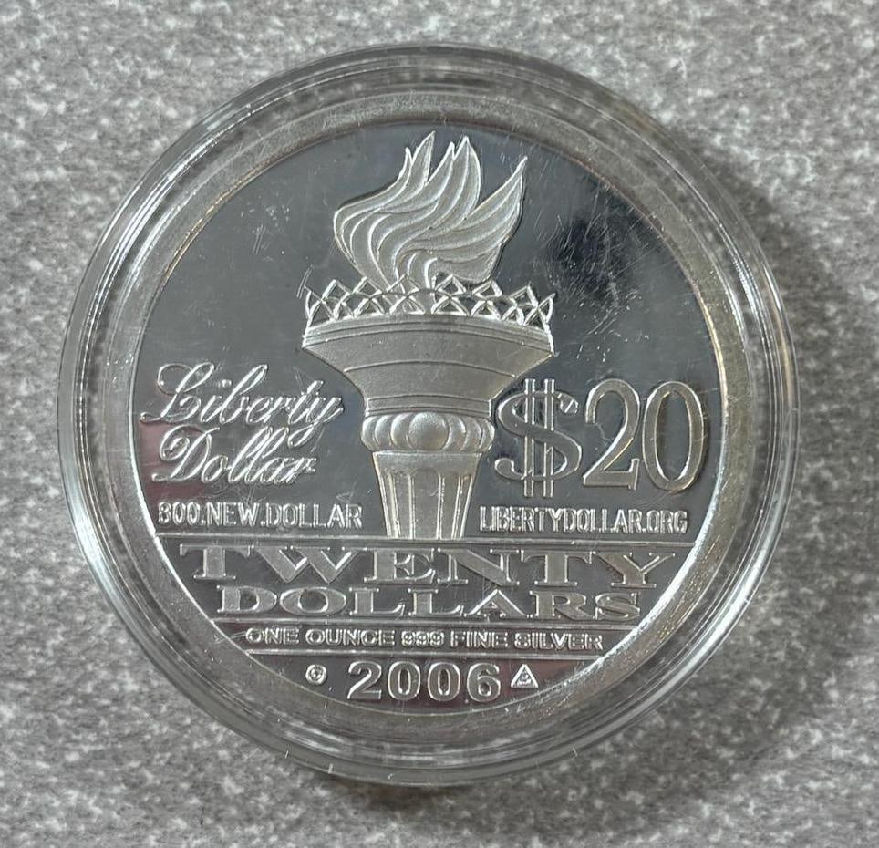 2006 Liberty Dollar Collectible Coin, $20 Face Value, One Ounce Fine Silver: IMPORTANT, WE ONLY ACCEPT CREDIT CARDS UP TO $500 FOR ONLINE COIN PURCHASES. YOU CAN PAY ACH THROUGH PROXIBID, OR YOU CAN SEND A WIRE OR CERTIFIED CHECK. WE WILL HOLD ALL SHIPPING OF COINS FOR 10 DAYS