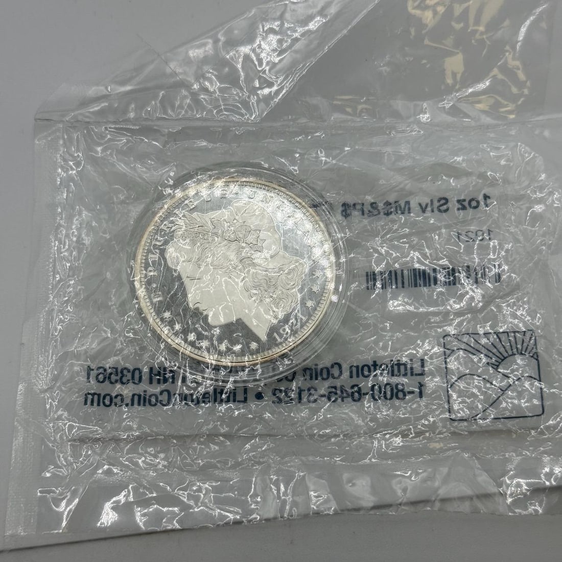 Littleton Coin Co. Silver Round, Morgan Dollar Design, 1 oz Fine .999 Silver, 1921: IMPORTANT, WE ONLY ACCEPT CREDIT CARDS UP TO $500 FOR ONLINE COIN PURCHASES. YOU CAN PAY ACH THROUGH PROXIBID, OR YOU CAN SEND A WIRE OR CERTIFIED CHECK. WE WILL HOLD ALL SHIPPING OF COINS FOR 10 DAYS