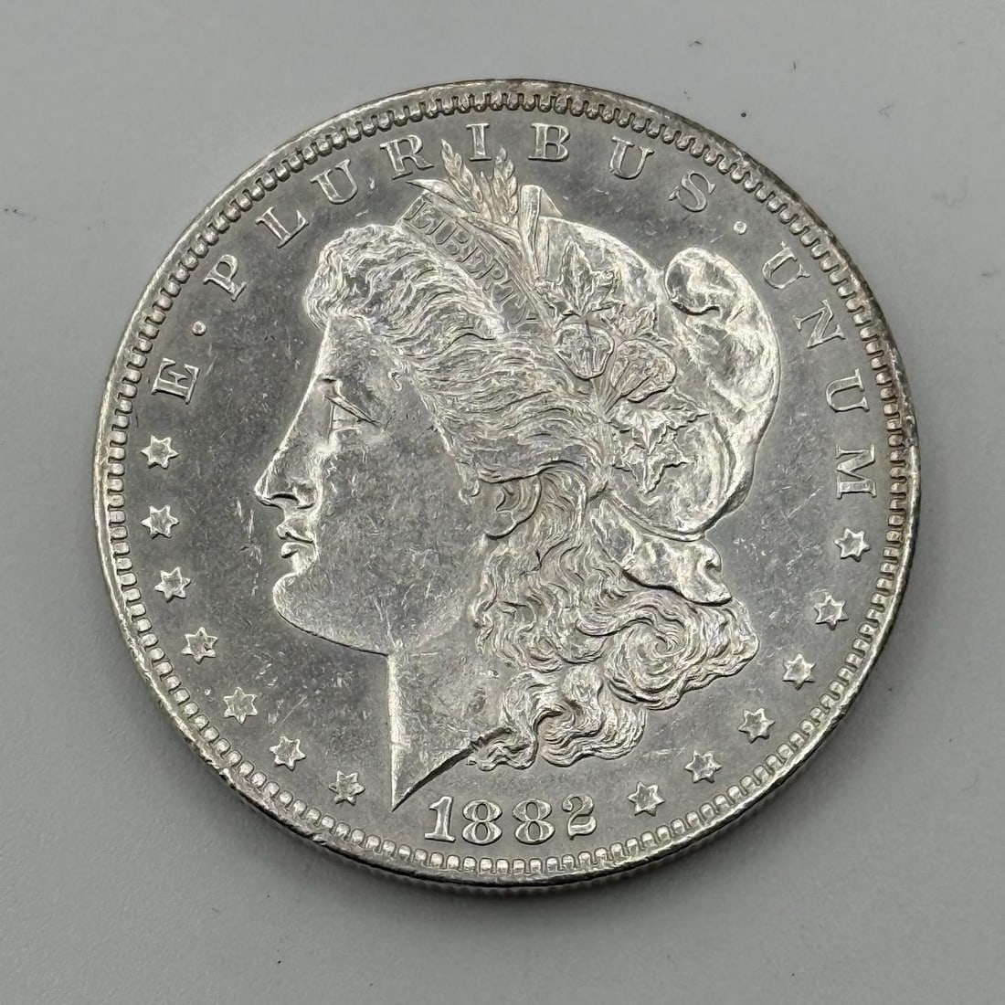 1882 O/S Morgan Silver Dollar, United States, 90% Silver (1 of 3)