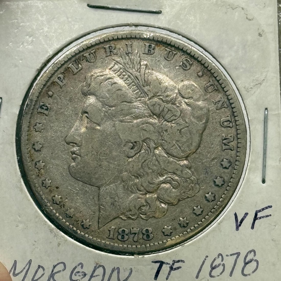 1878 (7 Tail Feathers) US Morgan Silver Dollar, 90% silver: IMPORTANT, WE ONLY ACCEPT CREDIT CARDS UP TO $500 FOR ONLINE COIN PURCHASES. YOU CAN PAY ACH THROUGH PROXIBID, OR YOU CAN SEND A WIRE OR CERTIFIED CHECK. WE WILL HOLD ALL SHIPPING OF COINS FOR 10 DAYS